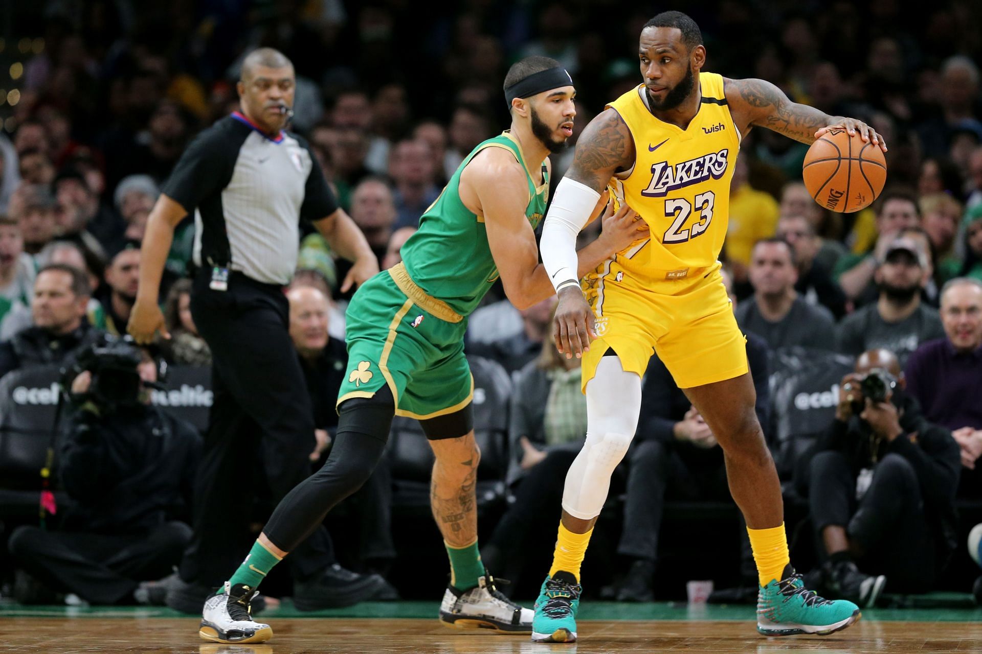 Jayson Tatum guards LeBron James during Los Angeles Lakers v Boston Celtics