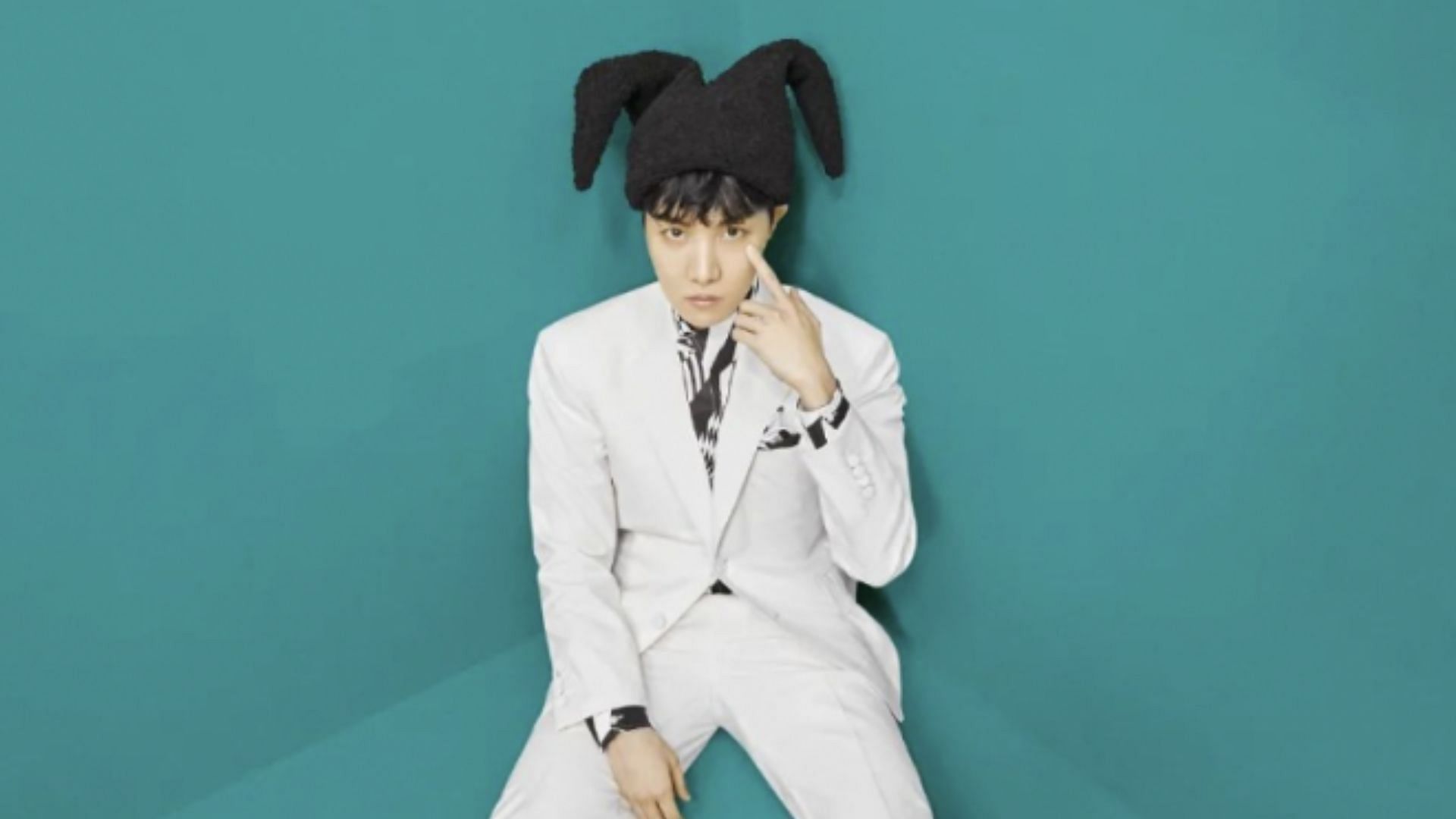 BTS&#039; j-hope poses for the concept photo of Jack in the Box (Image via HYBE)