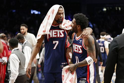 Kevin Durant and Kyrie Irving celebrate after Cleveland Cavaliers v Brooklyn Nets.