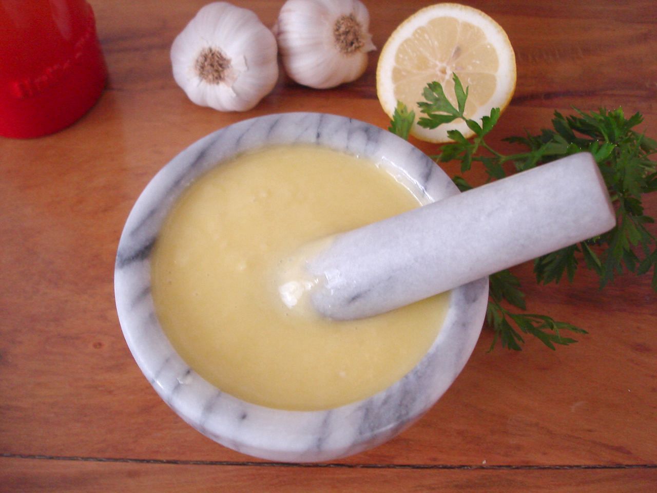 An emulsion of garlic, olive oil, eggs and salt, aioli is used in northwestern Mediterranean cuisine (Image via Flickr)