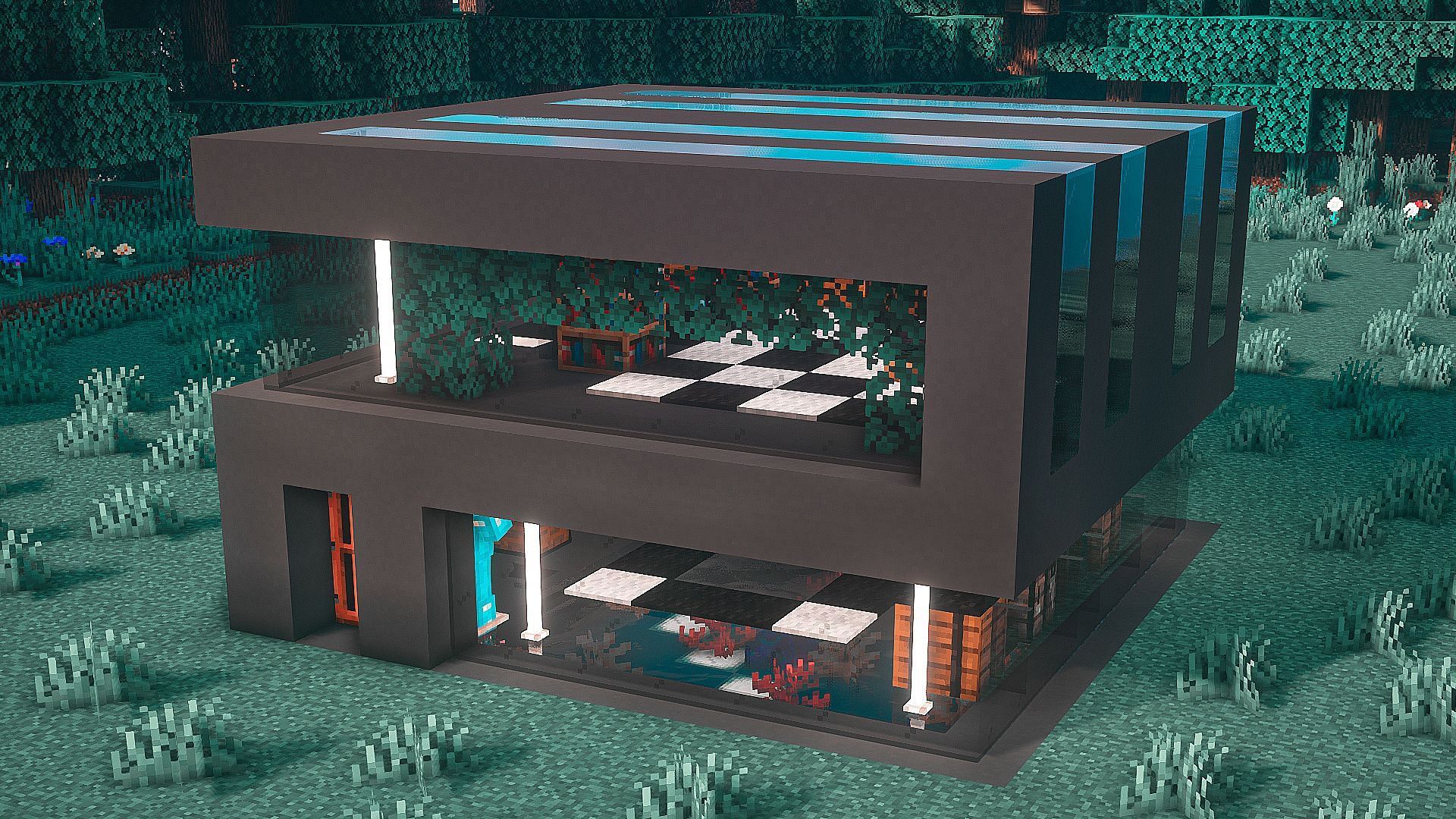 Brilliant modern house made with gray concrete blocks in Minecraft (Image via u/Kerbit Reddit)