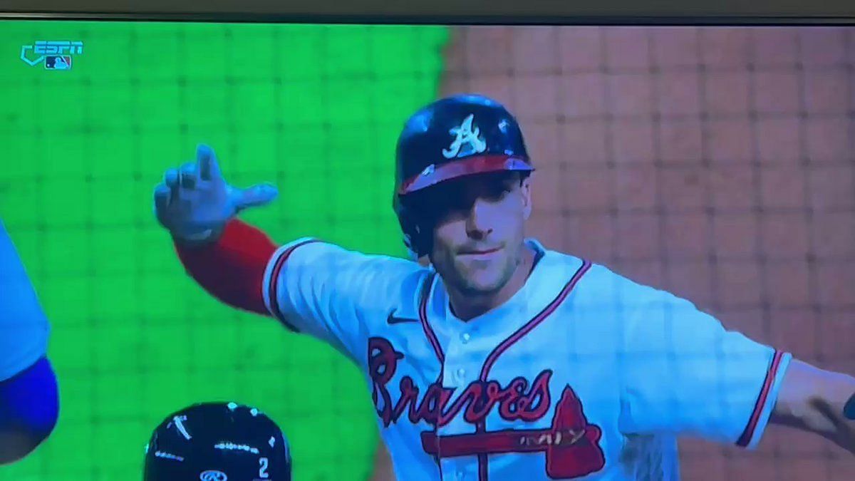 Atlanta Braves first baseman Freddie Freeman and New York Yankees  outfielder Aaron Judge share a laugh at first base after Judge hit a single  during the first inning of a MLB baseball