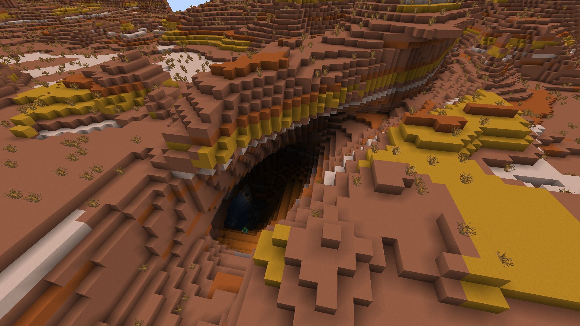 A ravine found in a badlands biome (Image via Minecraft)