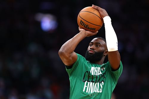 Jaylen Brown warms up before a game