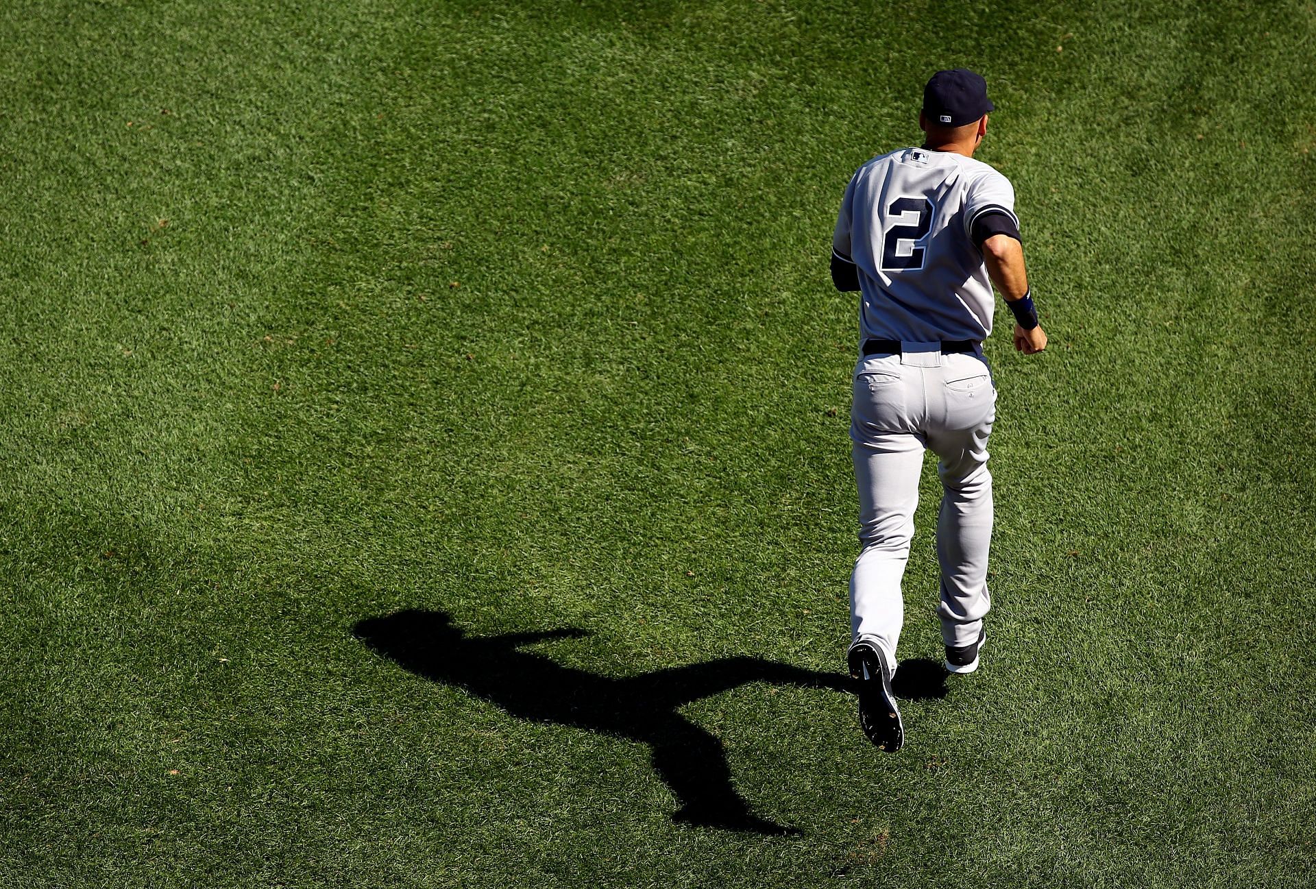 Derek Jeter runs onto the field during a New York Yankees v Boston Red Sox game.