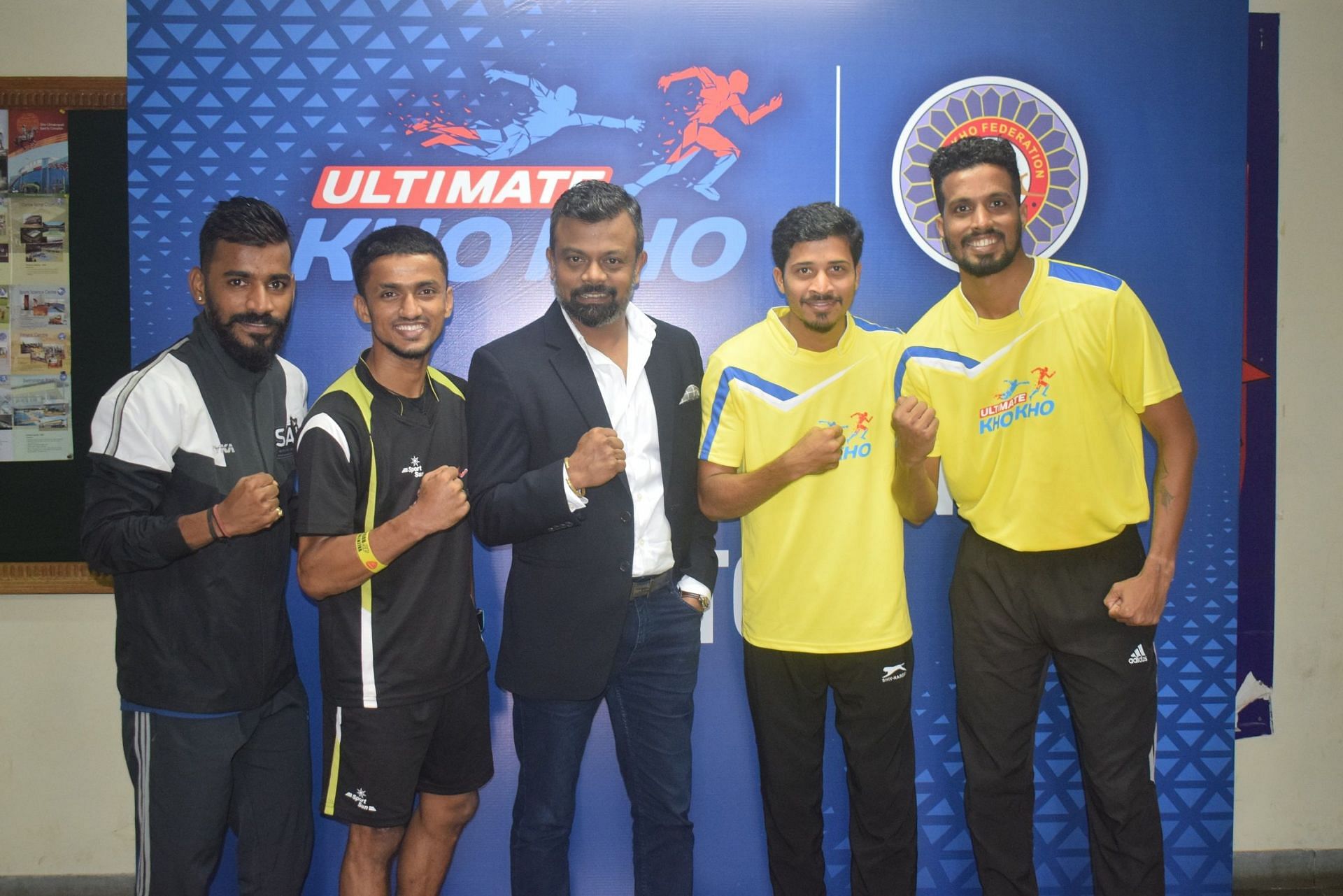 Ultimate Kho Kho CEO Tenzing Niyogi (C) poses along with the players in Pune on Thursday. (Picture credit: Ultimate Kho Kho)
