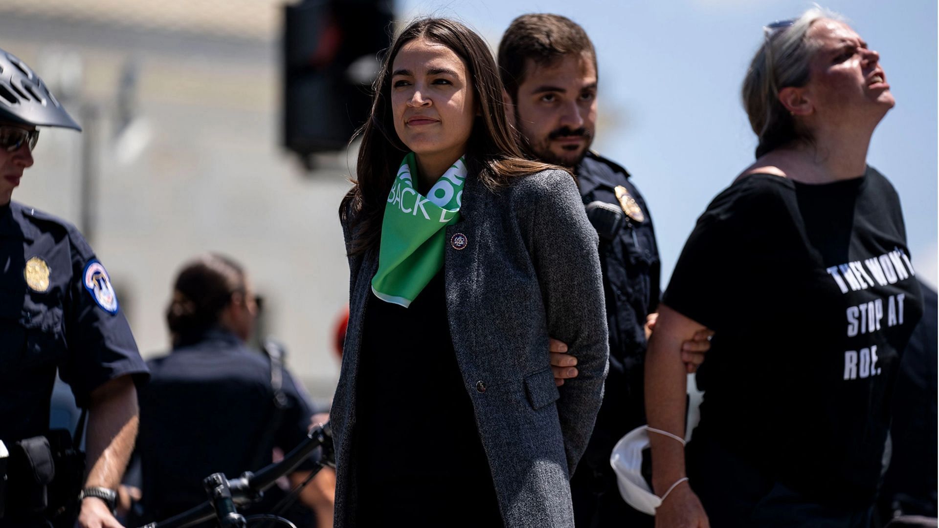 AOC was slammed online for pretending to be arrested at the US Capitol on July 19. (Image via Kent Nishimura/Getty)