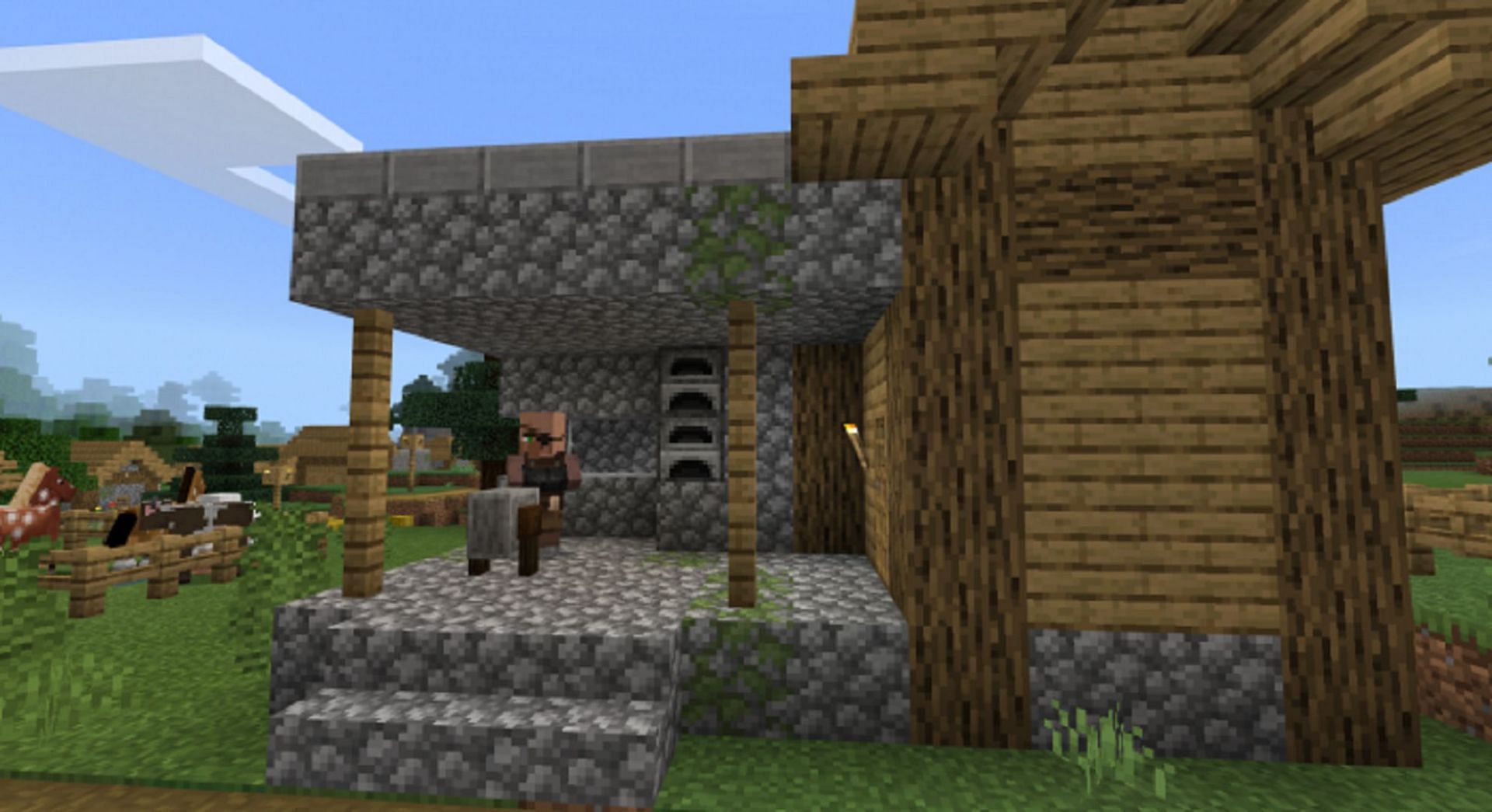 This seed features a blacksmith-heavy village close to spawn (Image via Mojang)