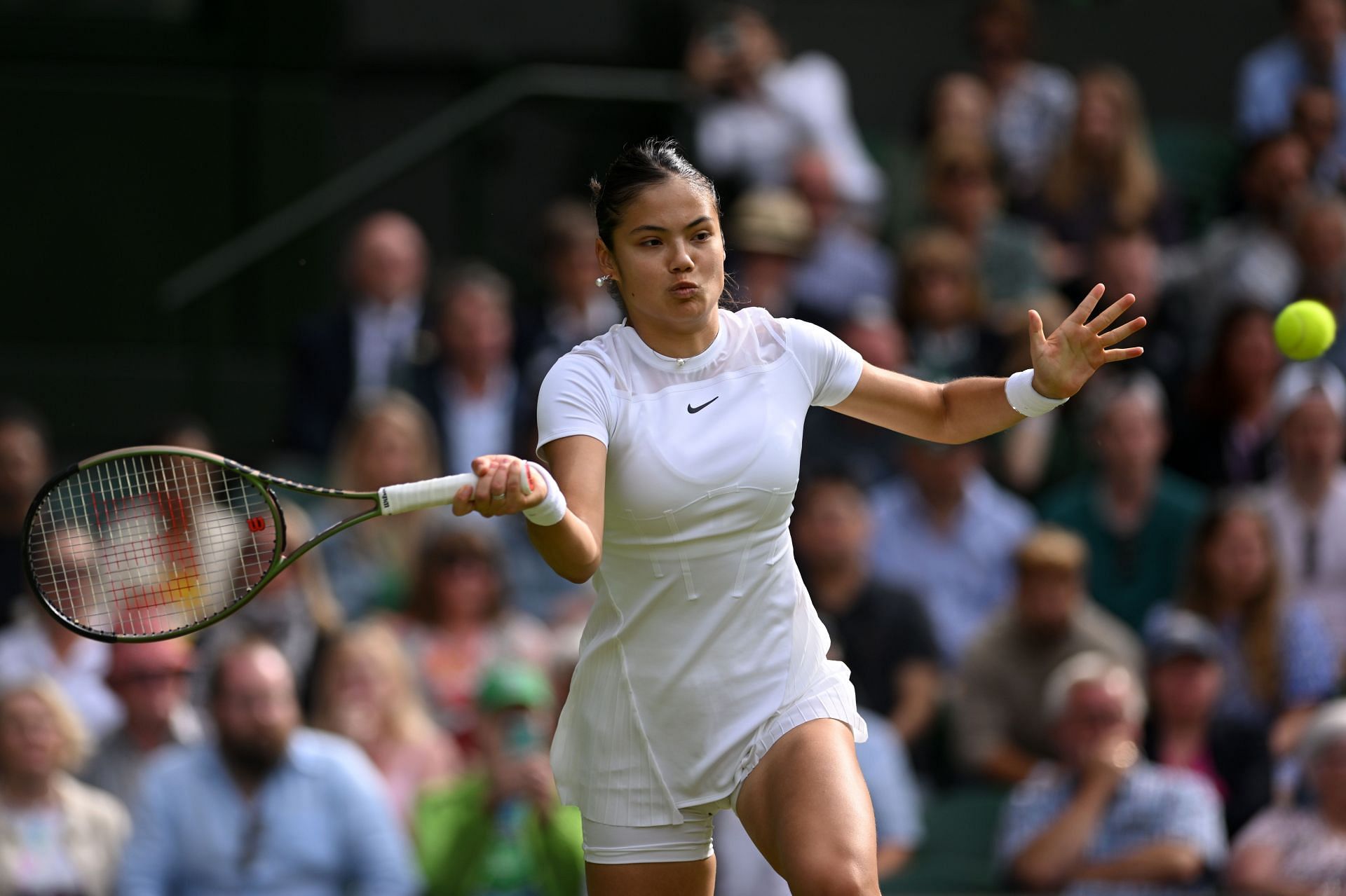 Emma Raducanu in action at Wimbledon