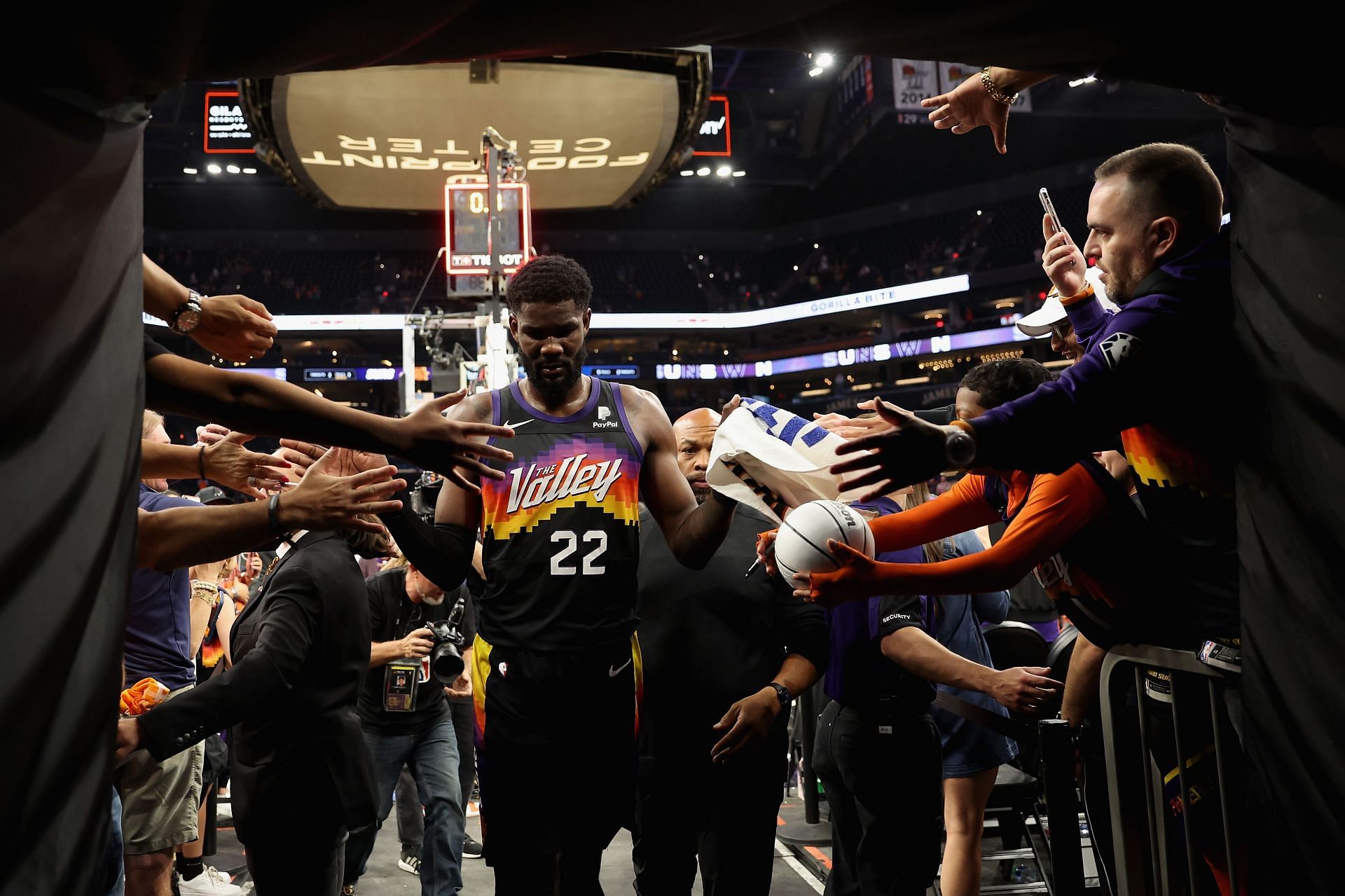 Deandre Ayton celebrates a win with the fans