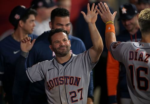 Jose Altuve celebrates in the dugout, Houston Astros v Los Angeles Angels.