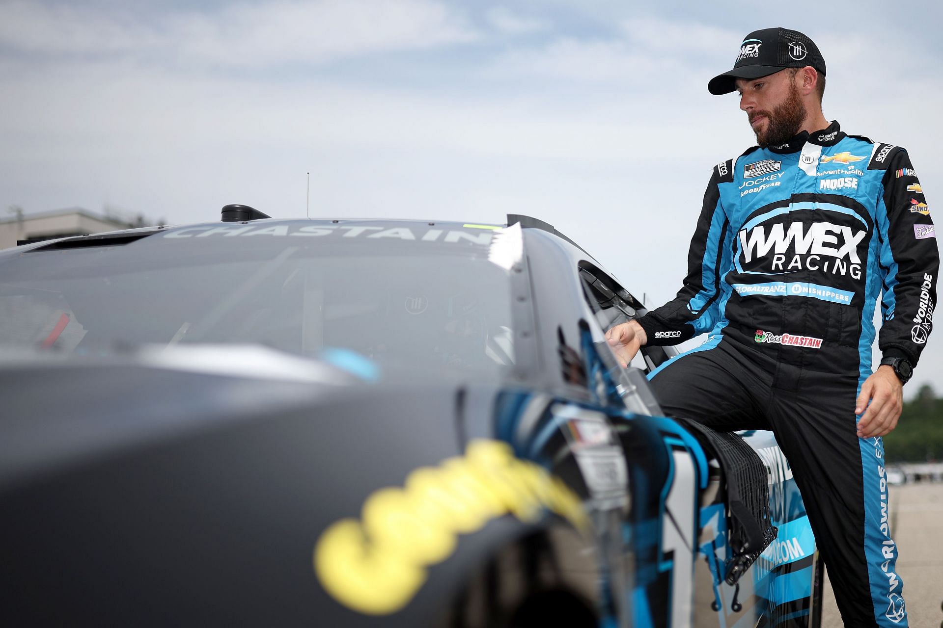 Ross Chastain enters his car during qualifying for the NASCAR Cup Series Ambetter 301 at New Hampshire Motor Speedway