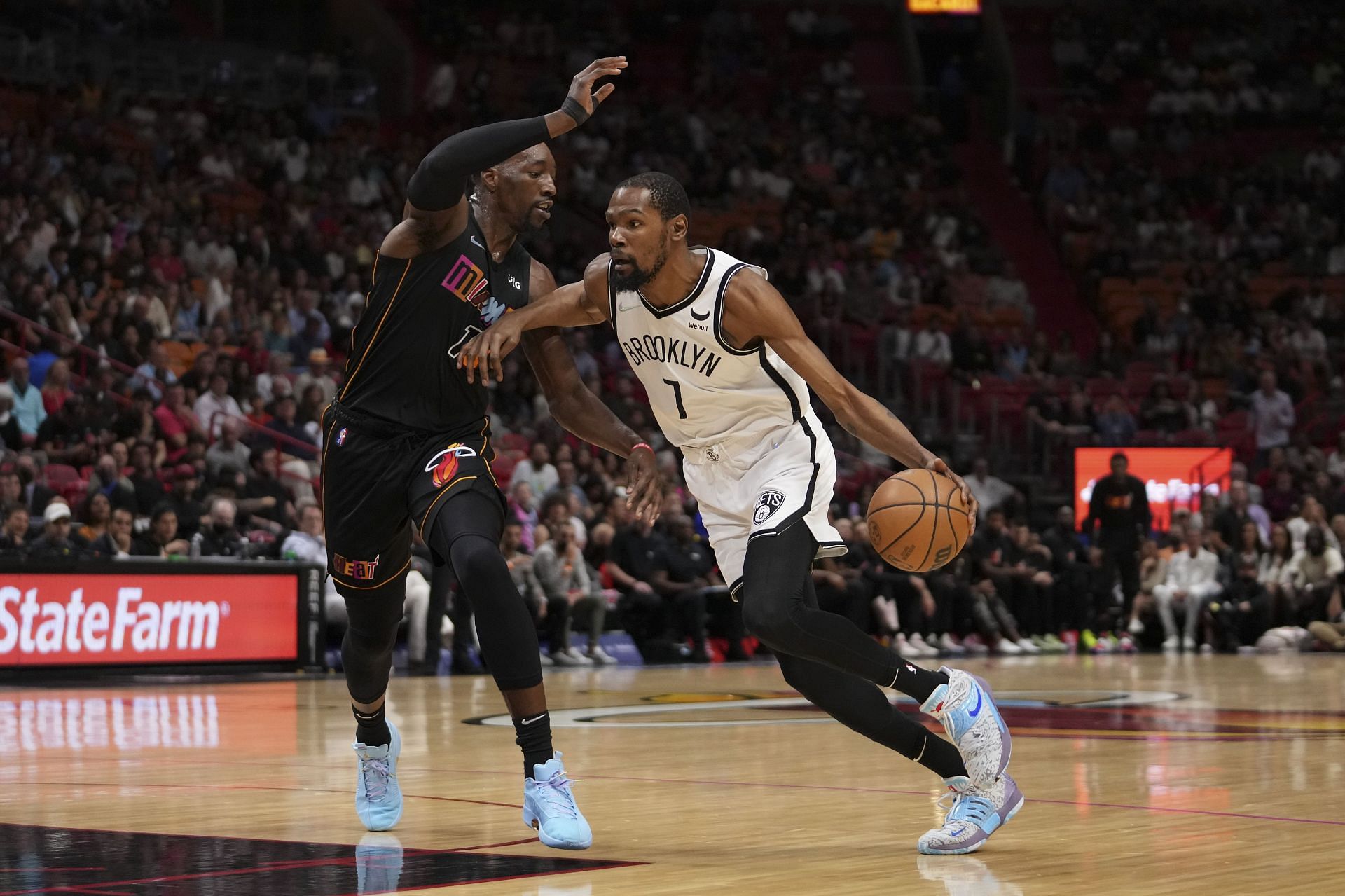 Bam Adebayo of the Miami Heat defends Kevin Durant of the Brooklyn Nets