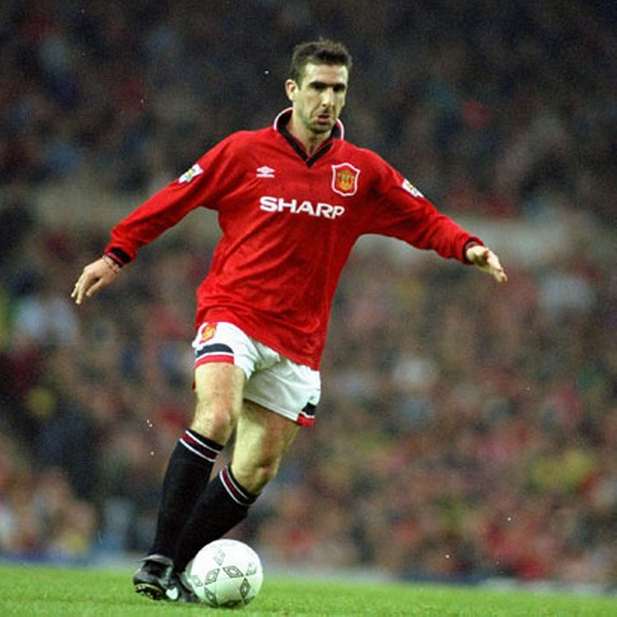 Eric Cantona in the home kit for 1993-94