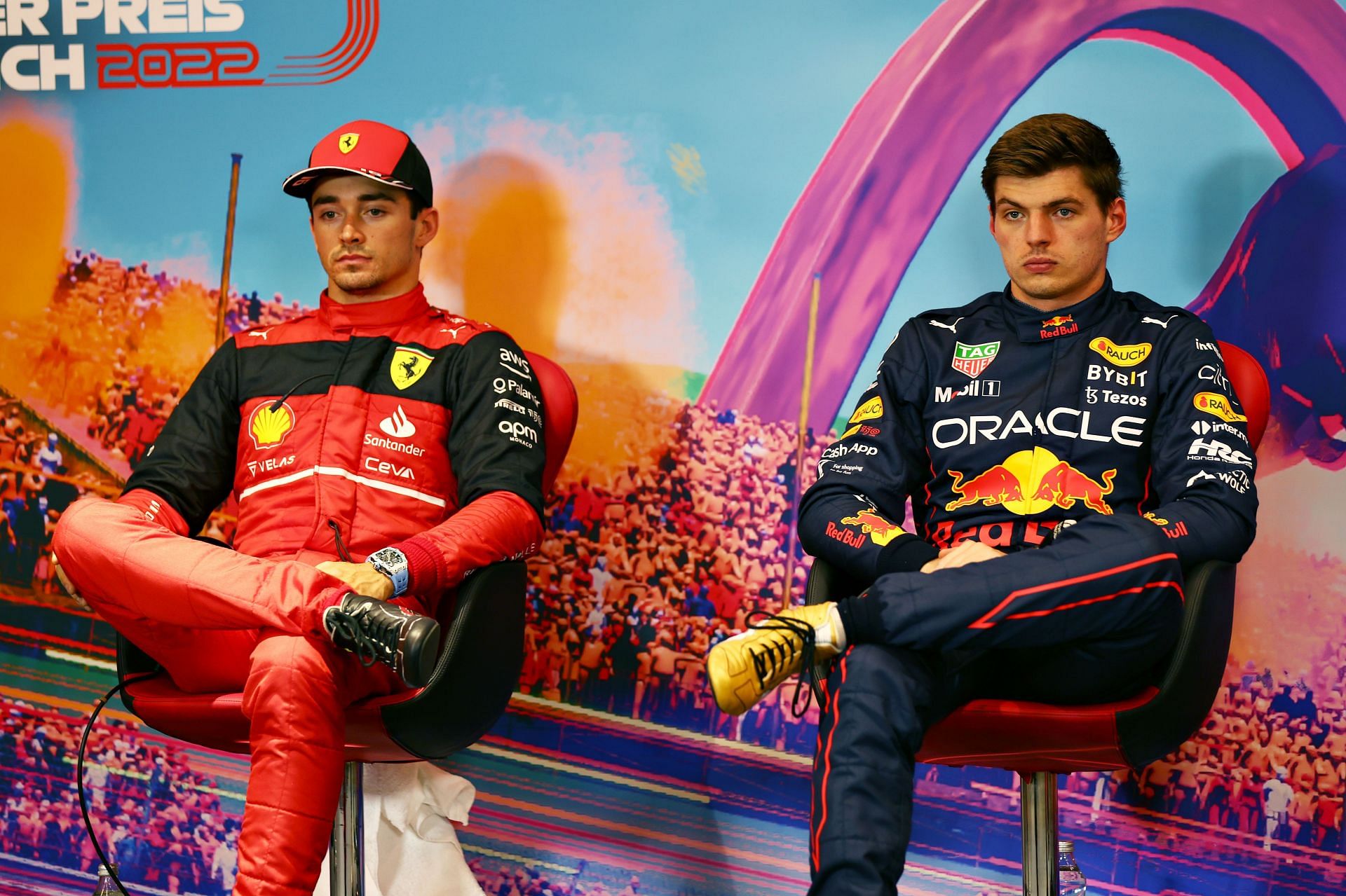 Charles Leclerc (left) was not too happy after the 2022 F1 Austrian GP Sprint