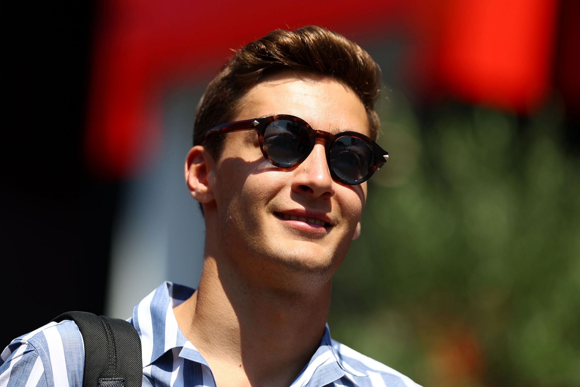 George Russell walks in the Paddock during previews ahead of the F1 Grand Prix of France at Circuit Paul Ricard on July 21, 2022, in Le Castellet, France. (Photo by Clive Rose/Getty Images)