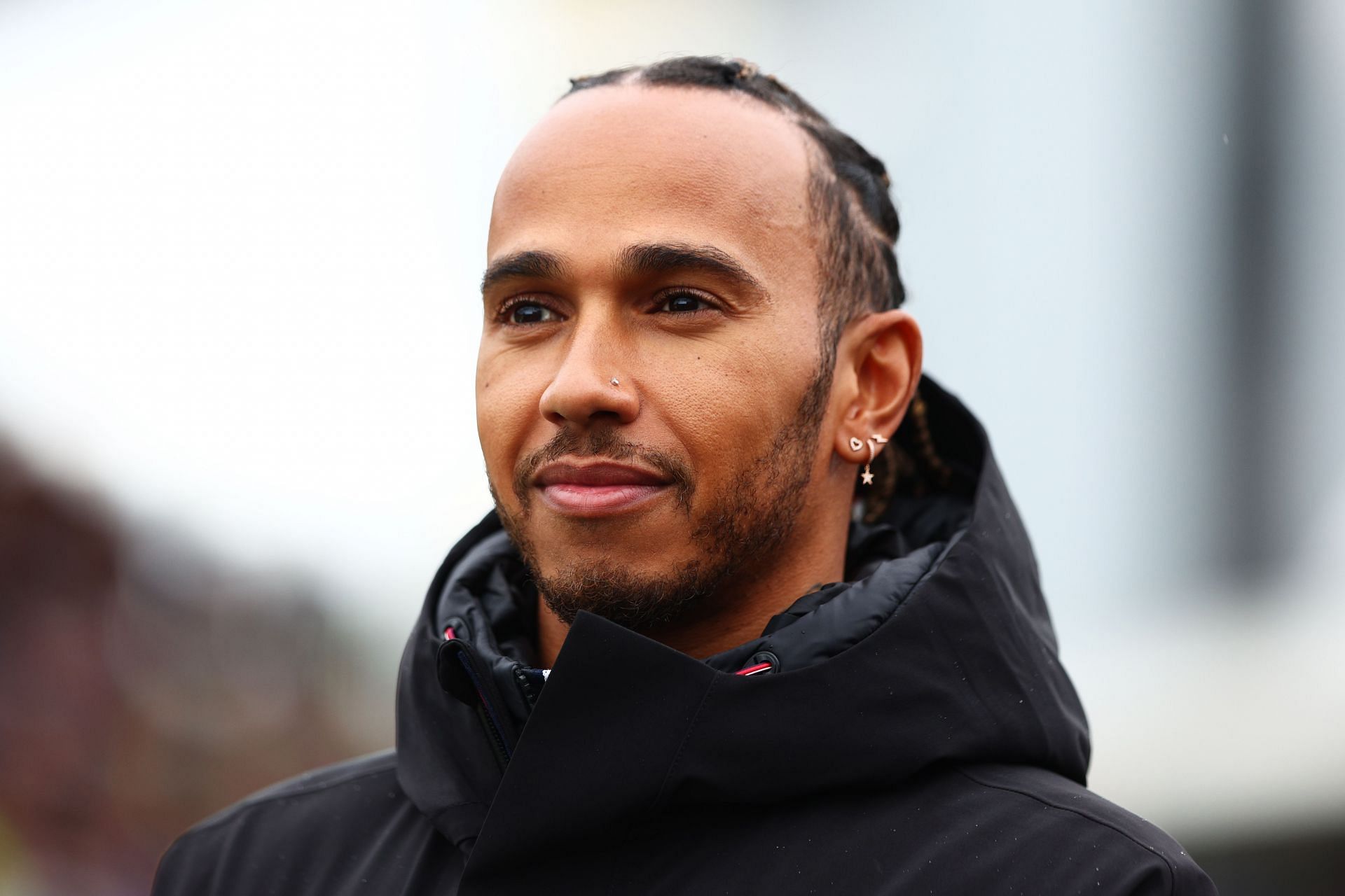 Lewis Hamilton looks on from the track during previews ahead of the F1 Grand Prix of Great Britain at Silverstone on June 30, 2022 in Northampton, England. (Photo by Clive Rose/Getty Images)