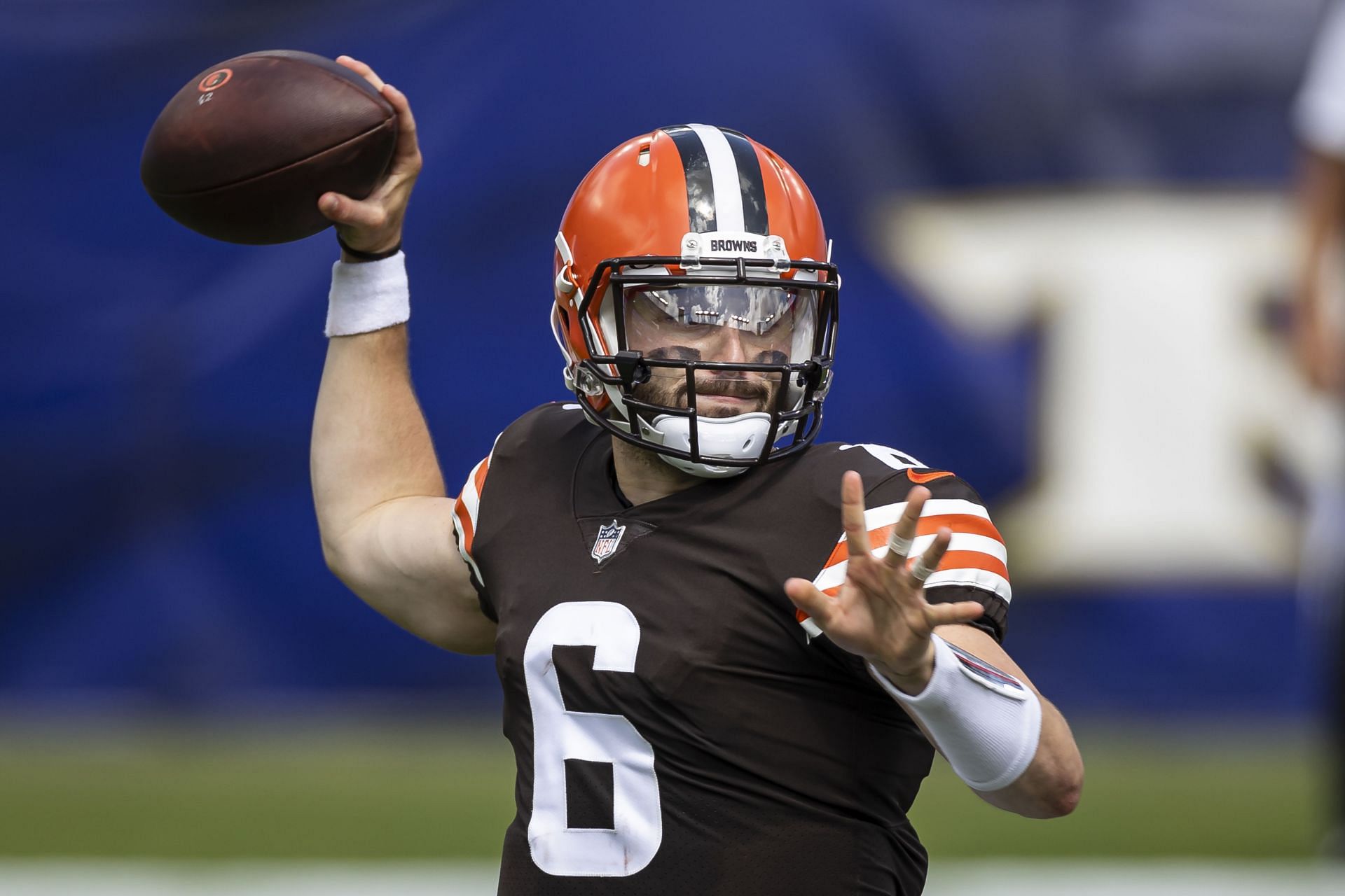 Former Cleveland Browns quarterback Baker Mayfield pulls back to pass