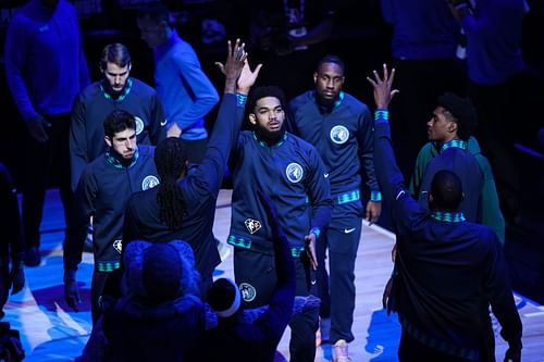 Karl-Anthony Towns of the Minnesota Timberwolves comes onto the floor.