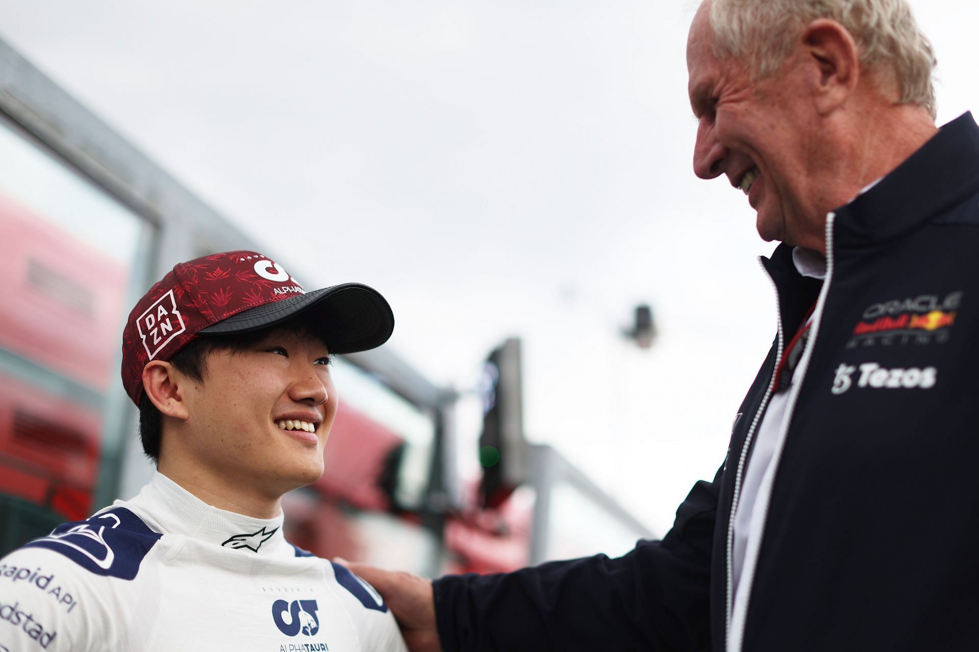 Yuki Tsunoda talks with Red Bull Racing team consultant Dr. Helmut Marko on the grid during Sprint ahead of the F1 Grand Prix of Emilia Romagna at Autodromo Enzo e Dino Ferrari on April 23, 2022, in Imola, Italy (Photo by Peter Fox/Getty Images)