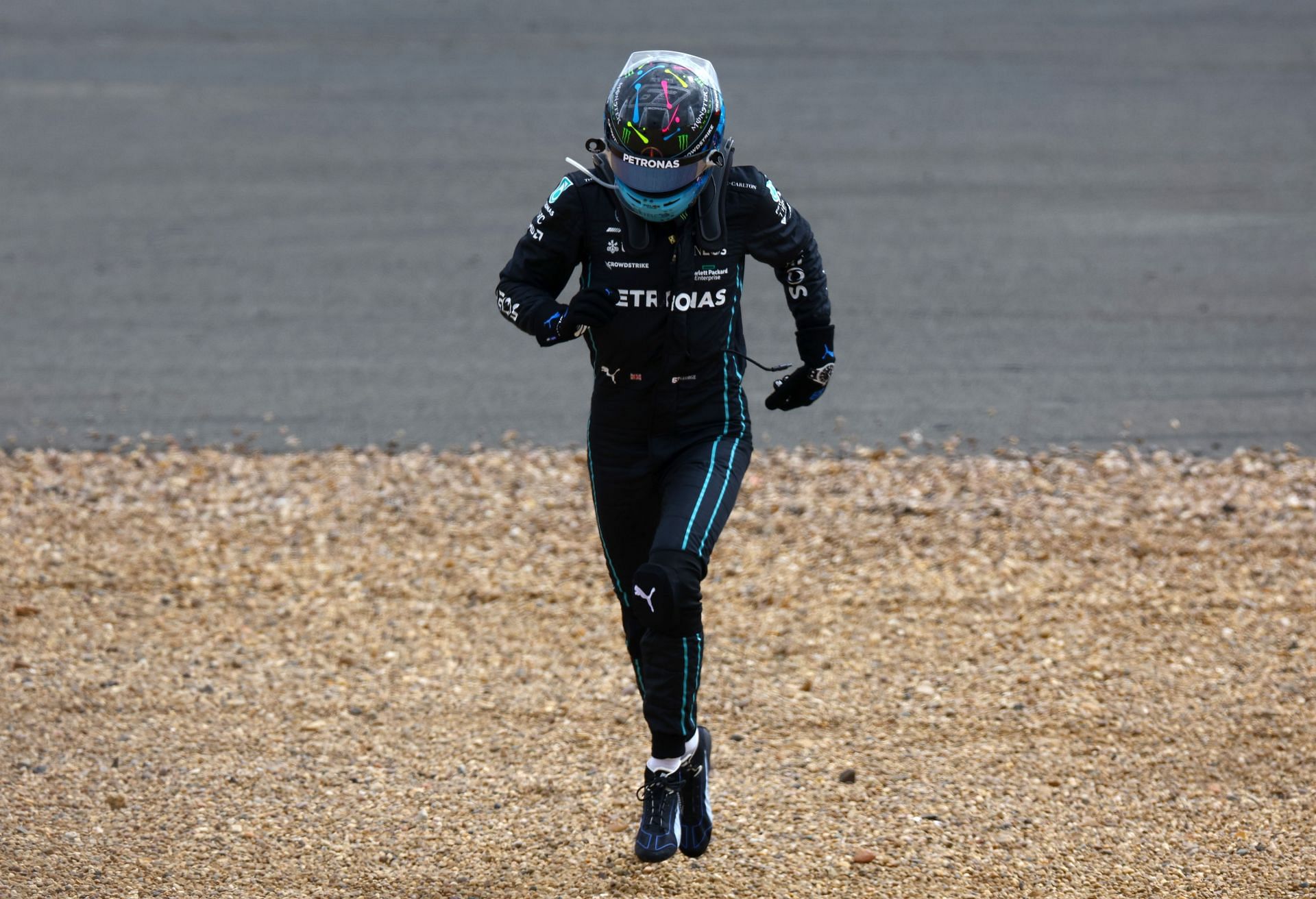 George Russell rushes to Zhou Guanyu&#039;s aid at the 2022 F1 Grand Prix of Great Britain