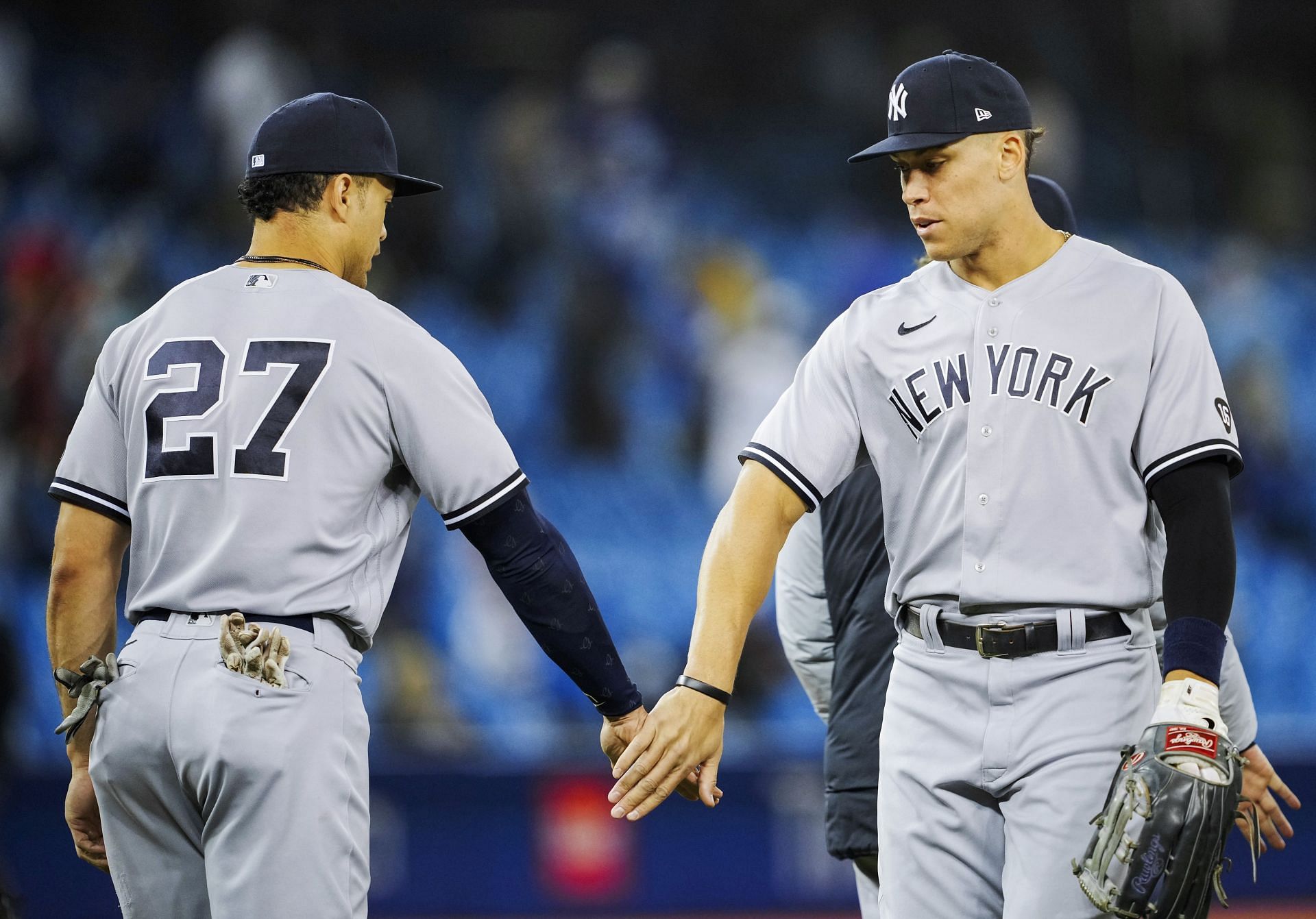 Aaron Judge and Giancarlo Stanton celebrate after defeating the Toronto Blue Jays.