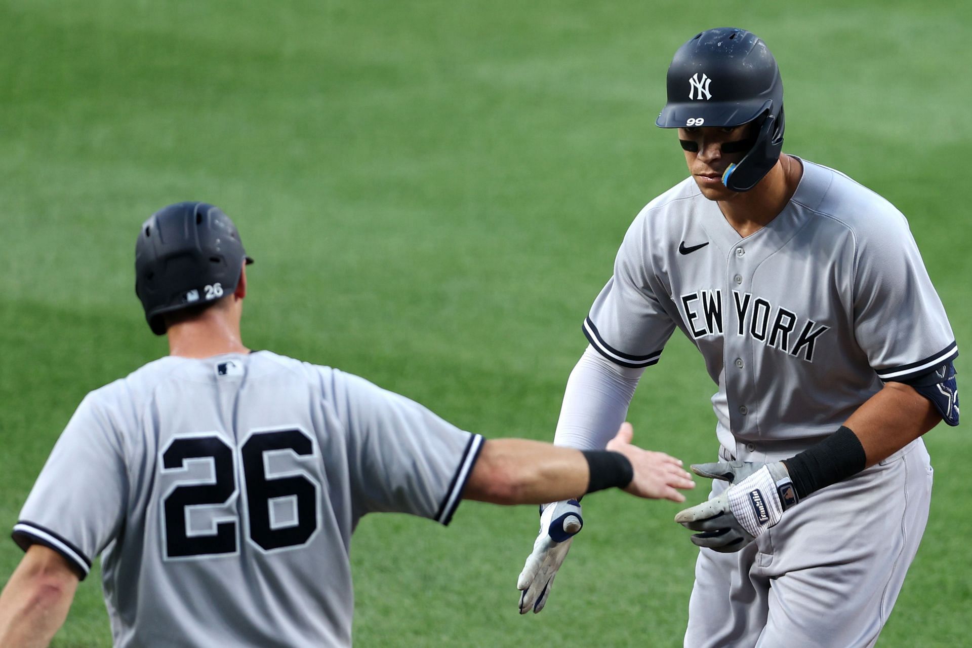 Aaron Judge and DJ LeMahieu celebrate after scoring during tonight&#039;s New York Yankees v Baltimore Orioles game.