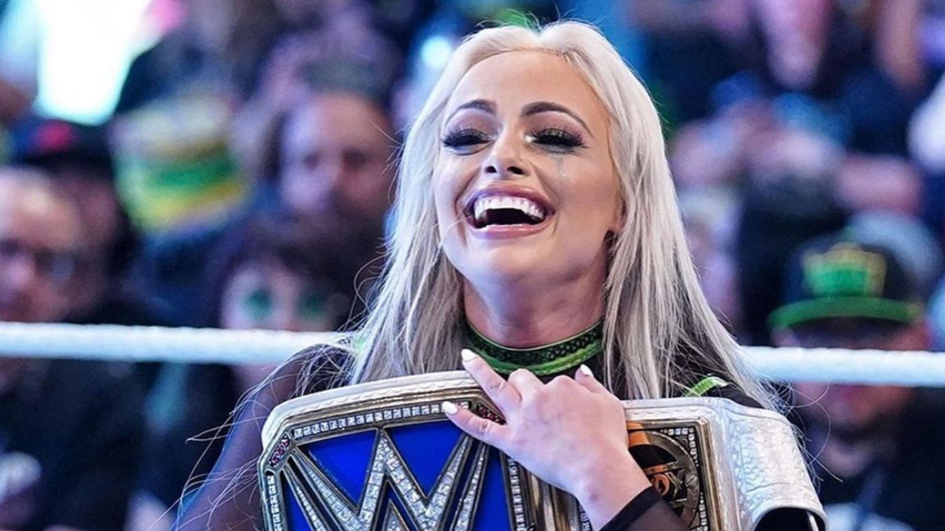 Liv Morgan celebrating after cashing in at WWE Money in the Bank!