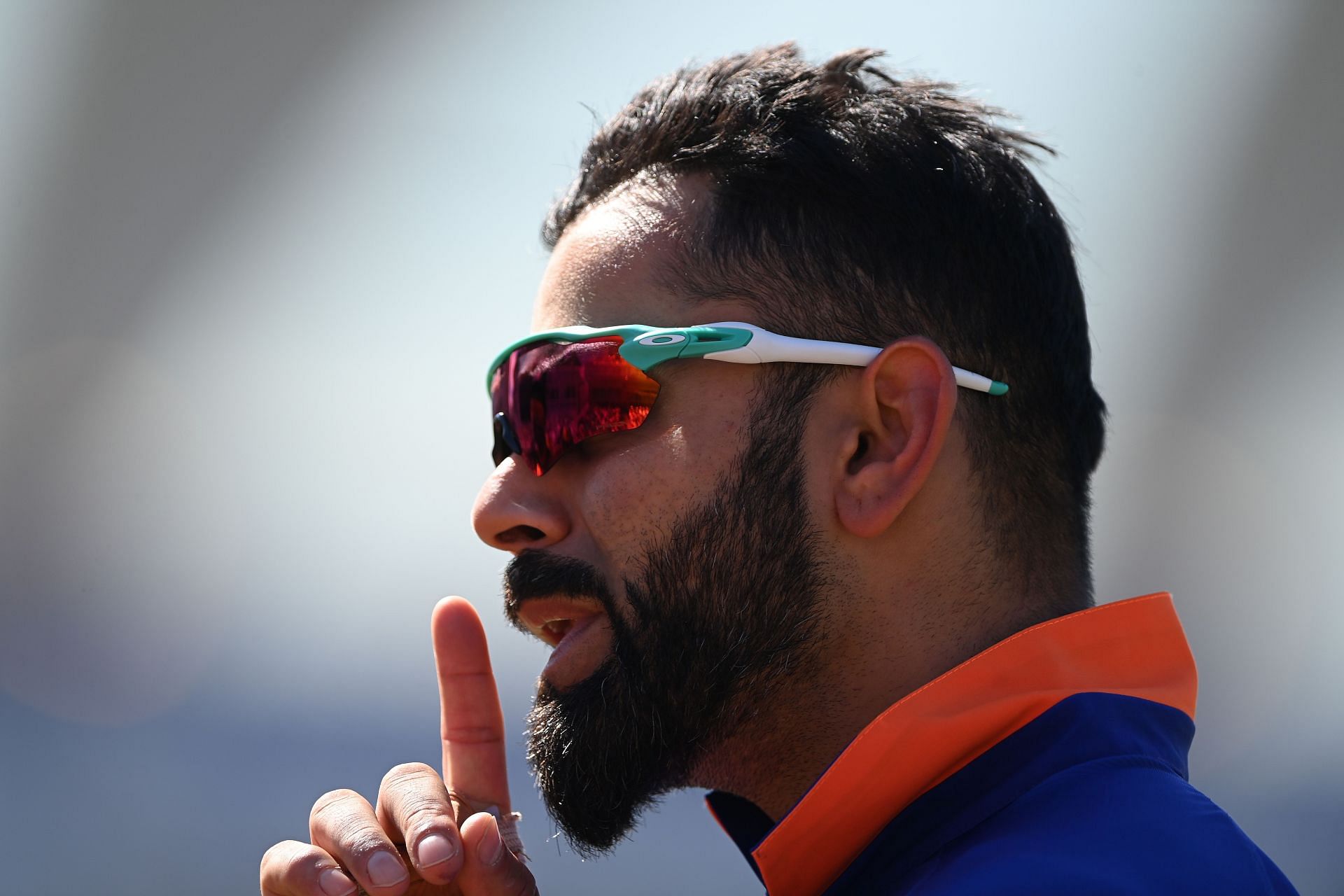 Virat Kohli interacts with spectators whilst fielding on the boundary during the third T20I. Pic: Getty Images