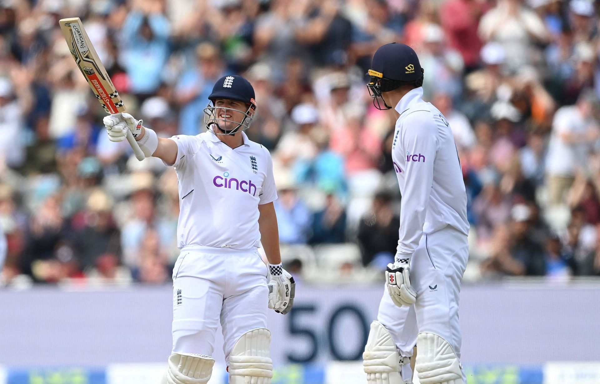 Alex Lees raises his bat after scoring a brisk half-century. (Credits: Getty)