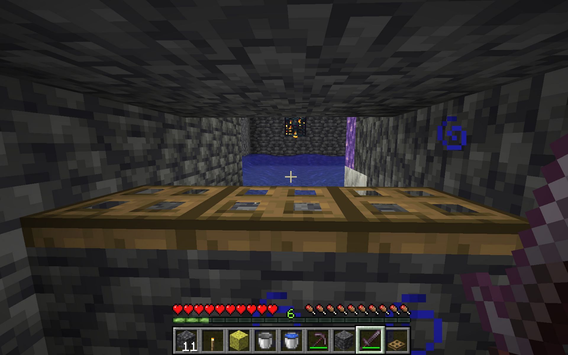 An extremely simple spawner mob farm trap (Image via Minecraft 1.19 update)