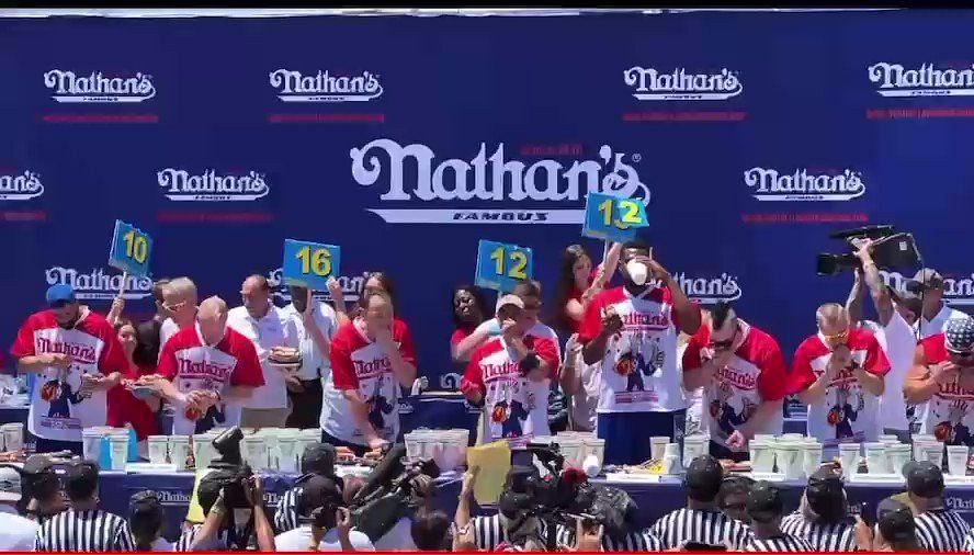 Tom Brady inspires hot dog-eating champion Joey Chestnut to keep