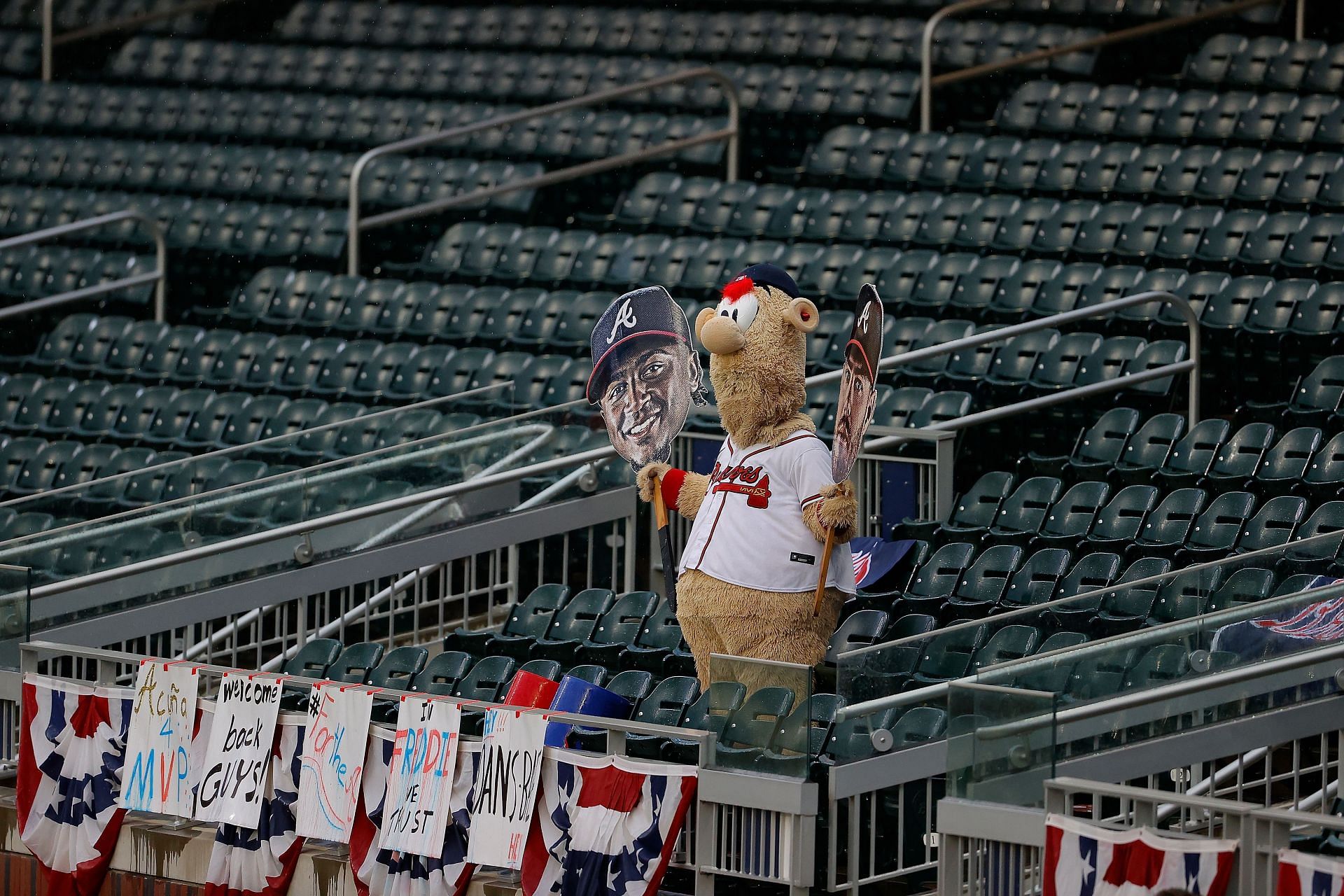 Does Blooper have health insurance? I am effing dying - Atlanta Braves  fans impressed by mascot Blooper going through tables to fire up the crowd