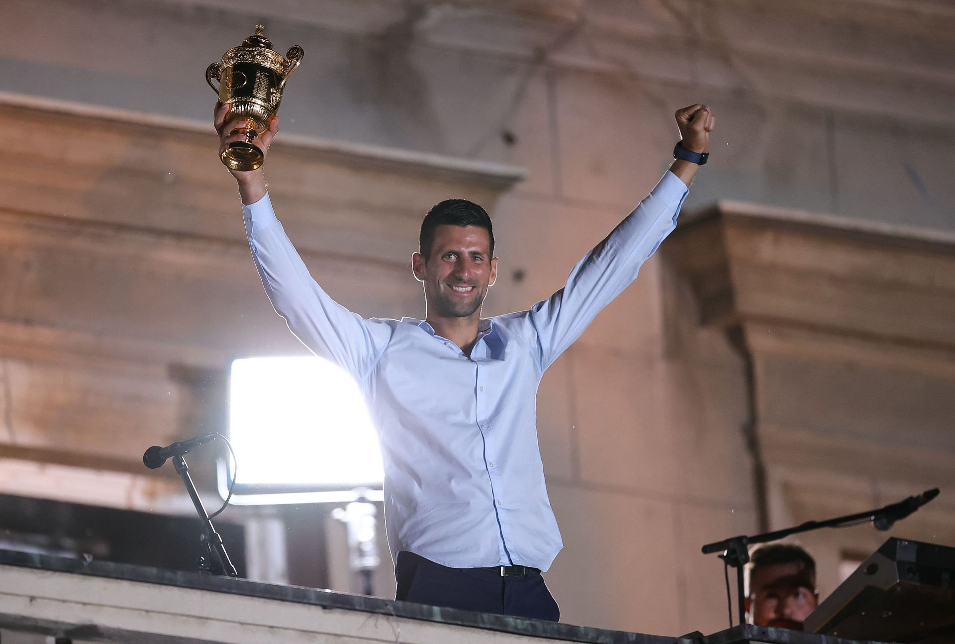 Novak Djokovic greets fans after returning to Serbia as the Wimbledon champion.