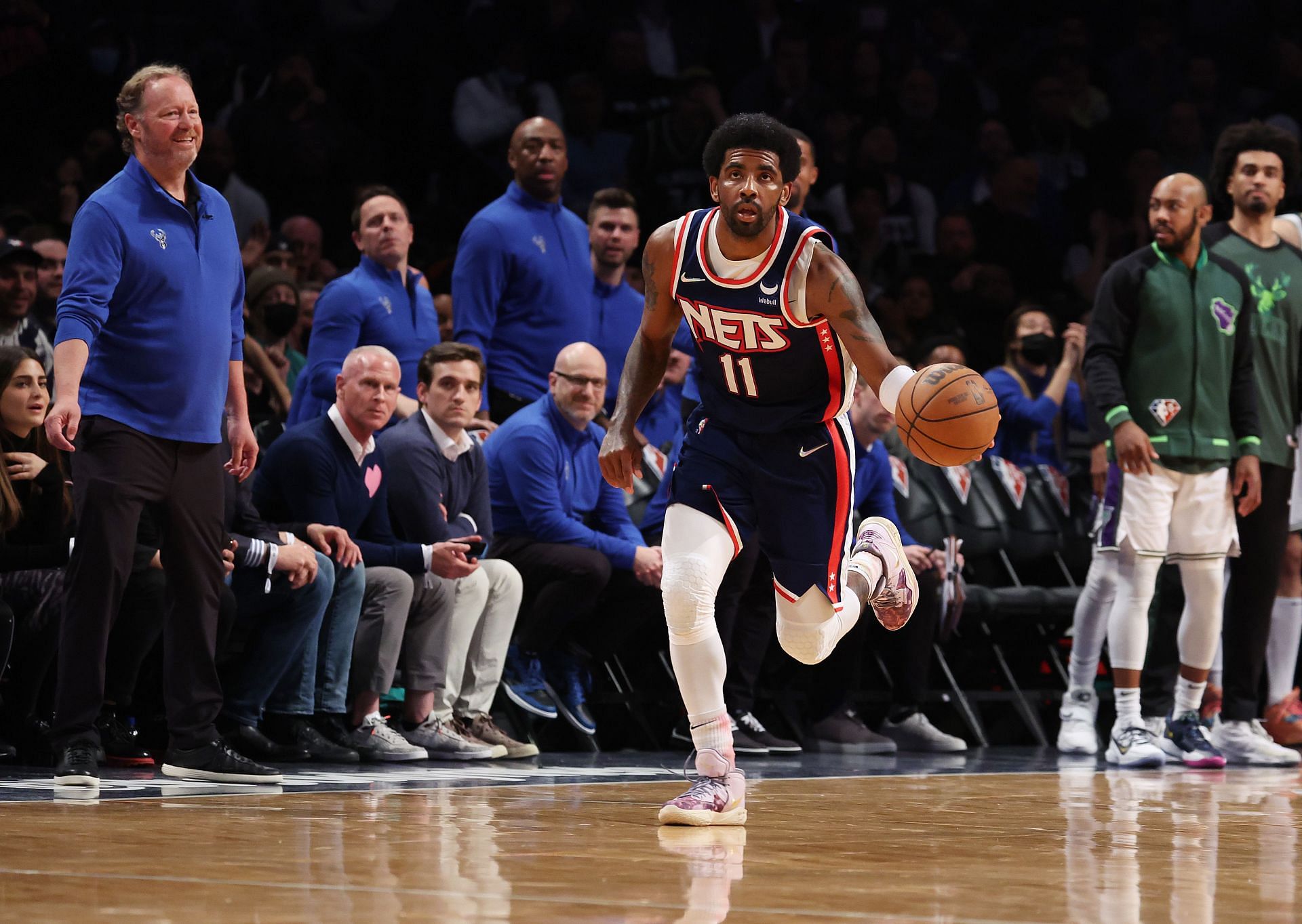 Kyrie Irving of the Brooklyn Nets dribbles against the Milwaukee Bucks on March 31 in New York City.