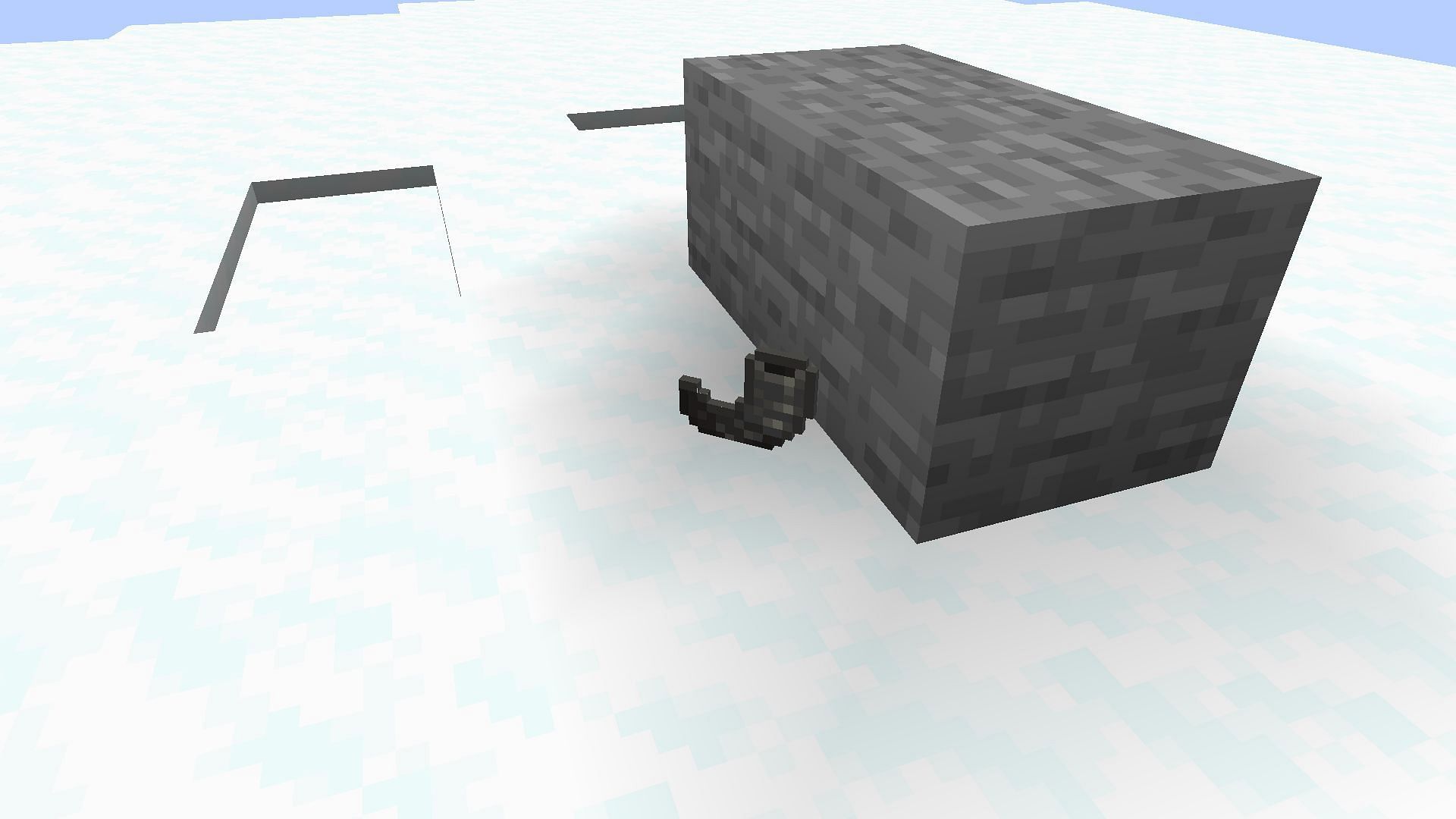 Goat rams into stone block and drops its horn (Image via Minecraft 1.19 update)