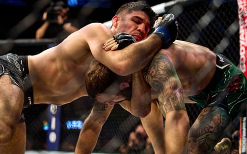 Vicente Luque submits Michael Chiesa at UFC 265 (Image Credit: Cooper Neill/Zuffa LLC)