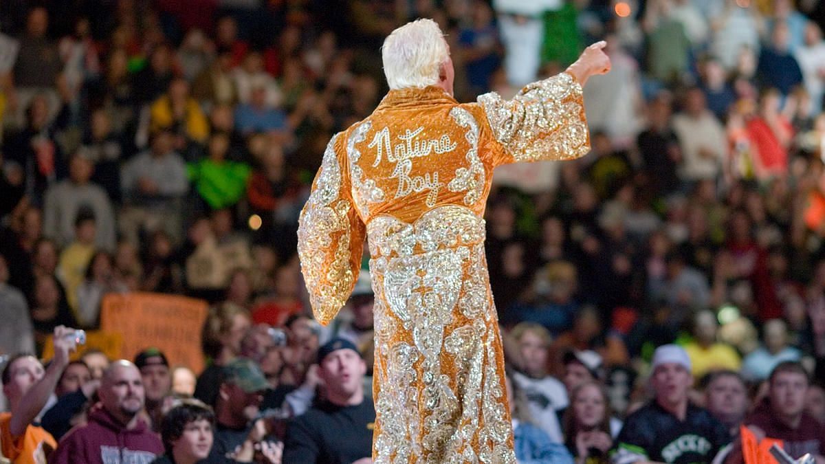 The Nature Boy looks resplendent in his classy signature robe