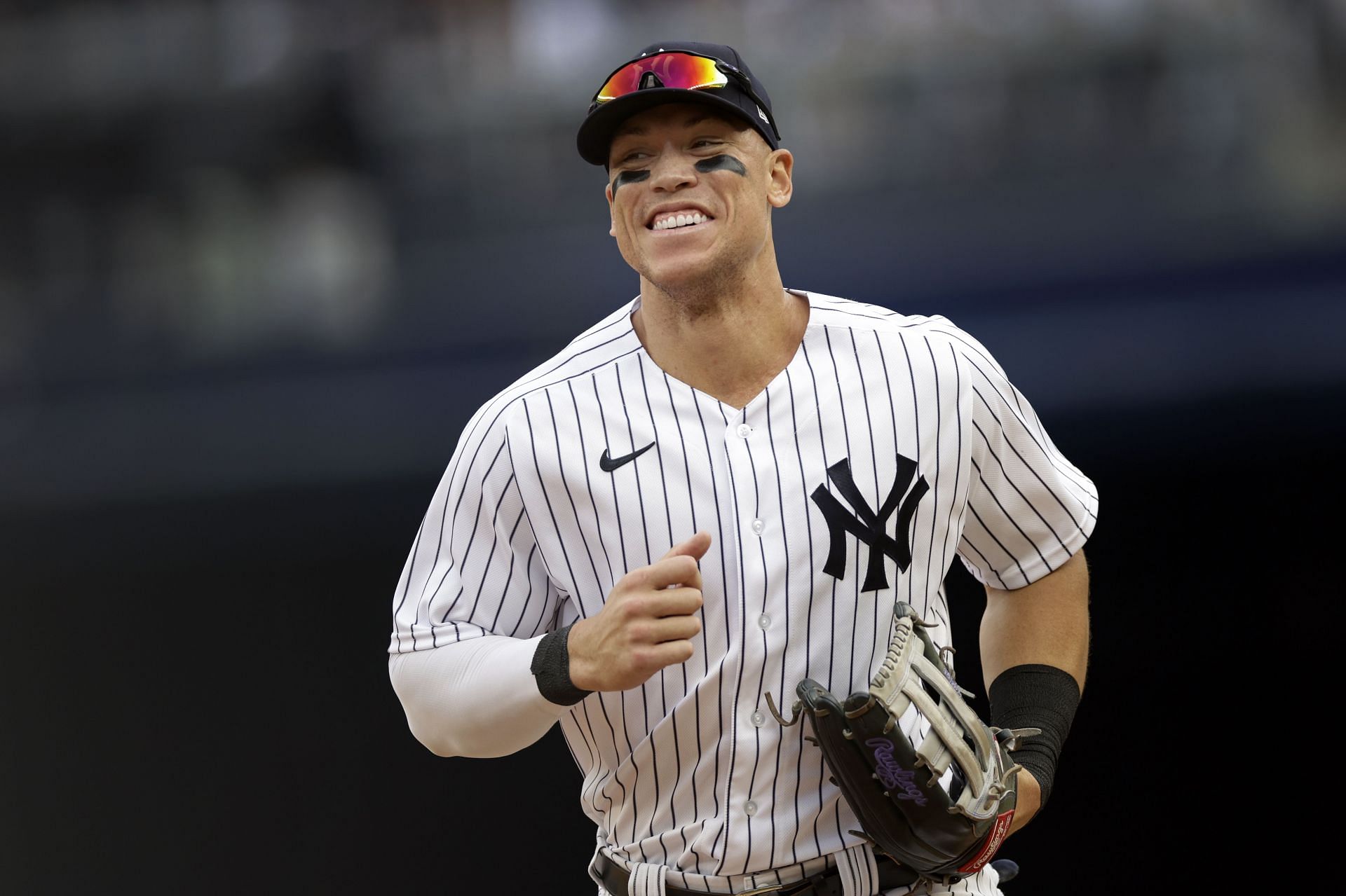 Aaron Judge runs back to the dugout during a Chicago Cubs v New York Yankees game.