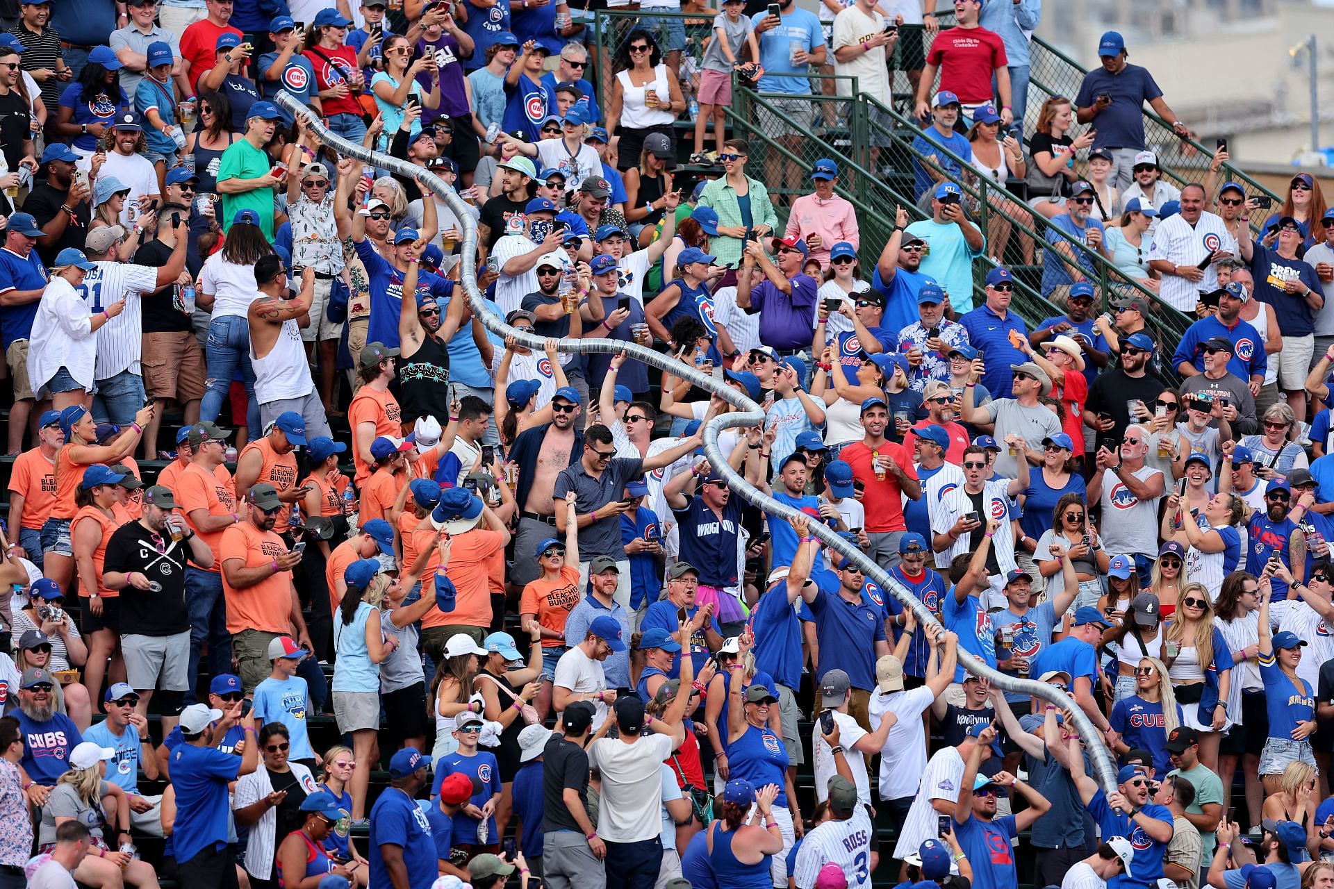 Chicago Cubs fans in the bleachers of Wrigley Field.