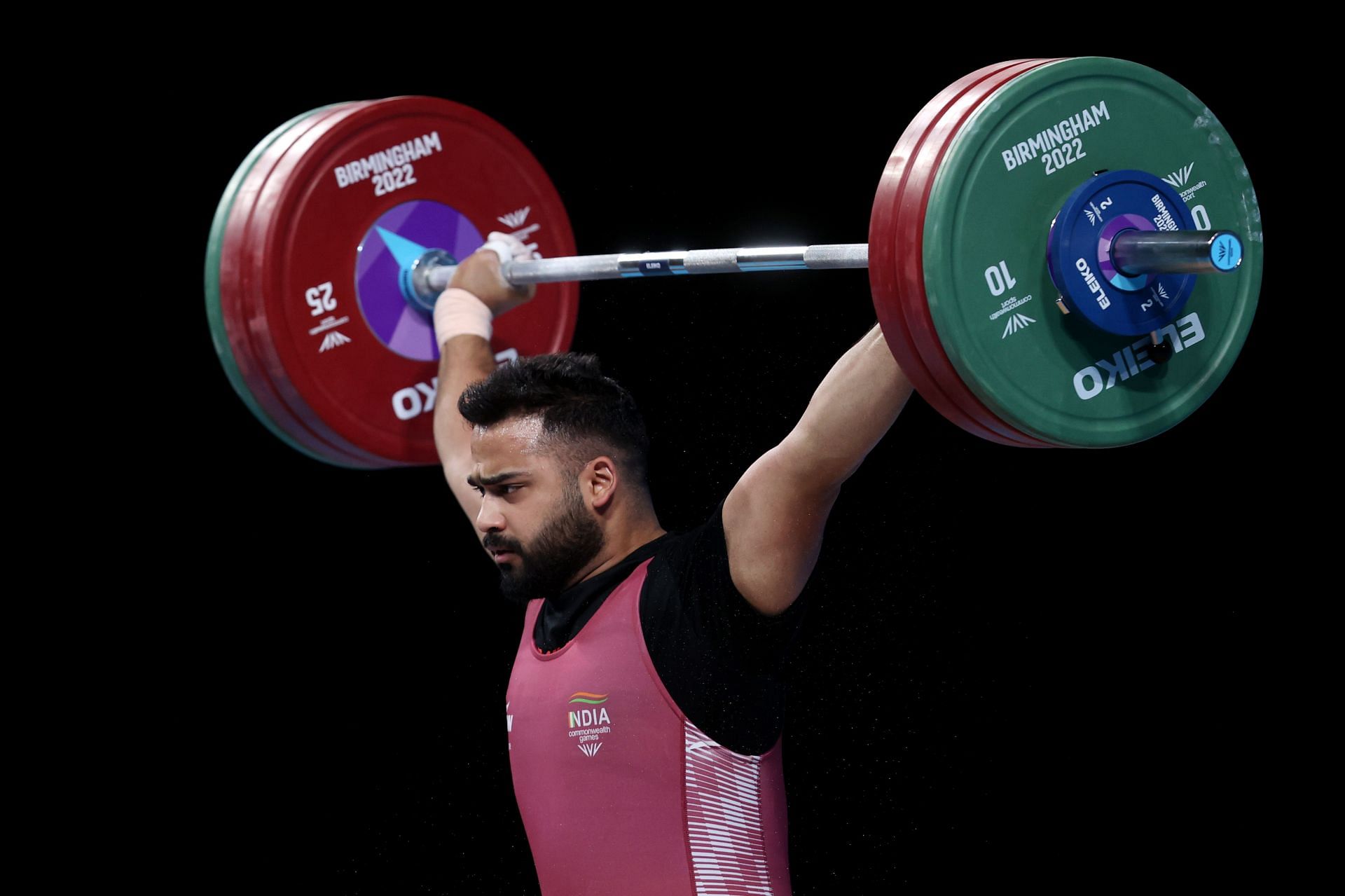 Weightlifting - Commonwealth Games: Day 5 Vikas Thakur in action