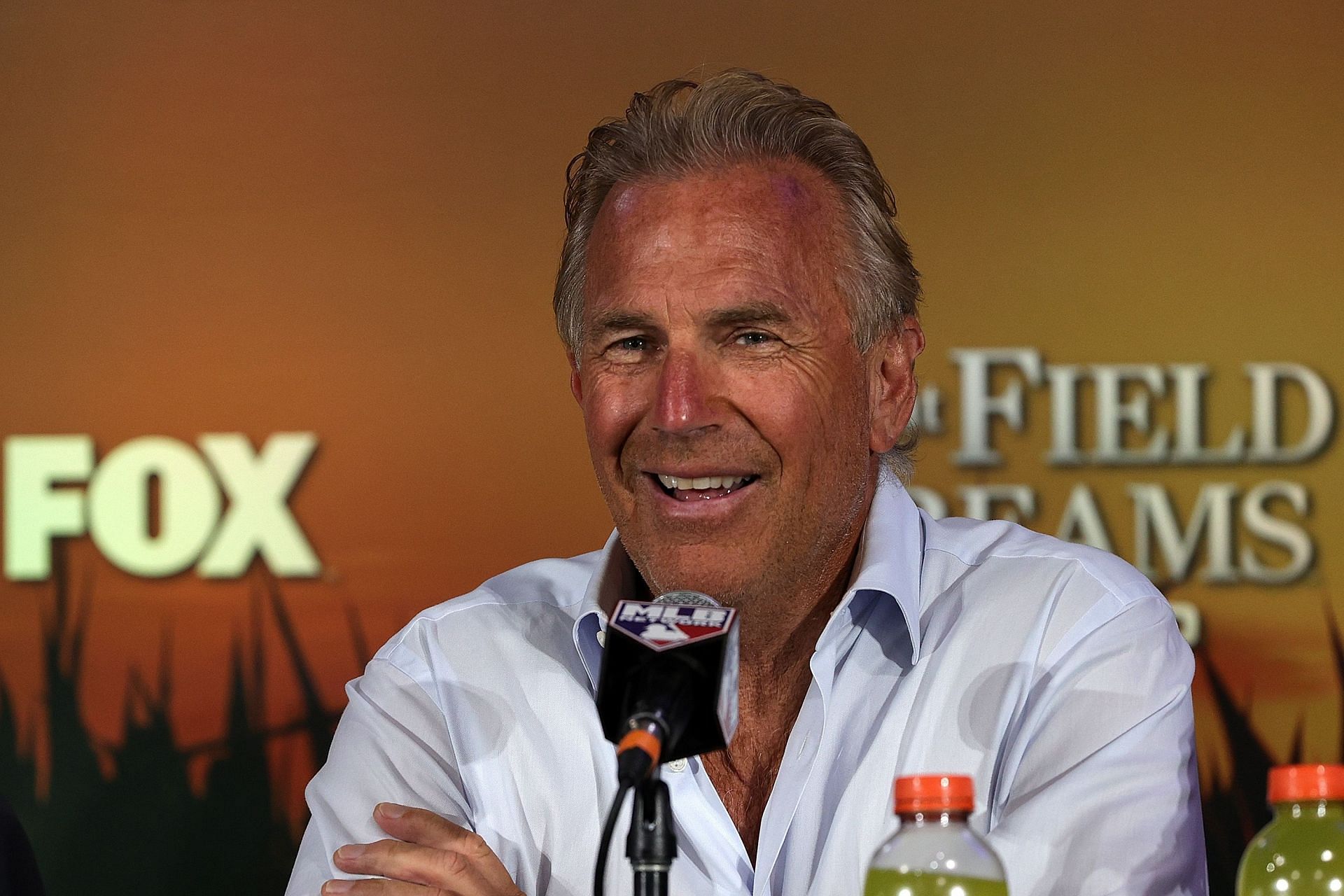 Kevin Costner speaking with the media