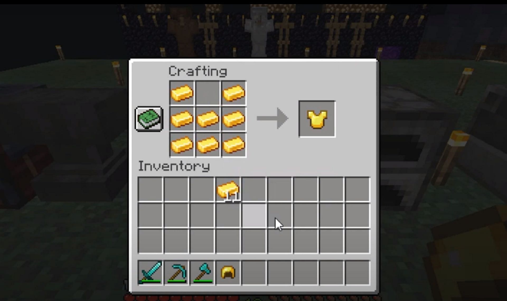A player crafts a golden breastplate in Minecraft (Image via Mojang)