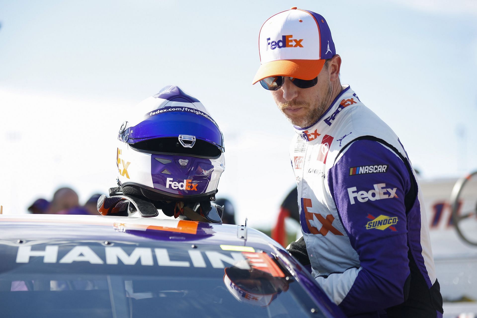 Denny Hamlin enters his car during practice for the NASCAR Cup Series Federated Auto Parts 400 at Richmond Raceway
