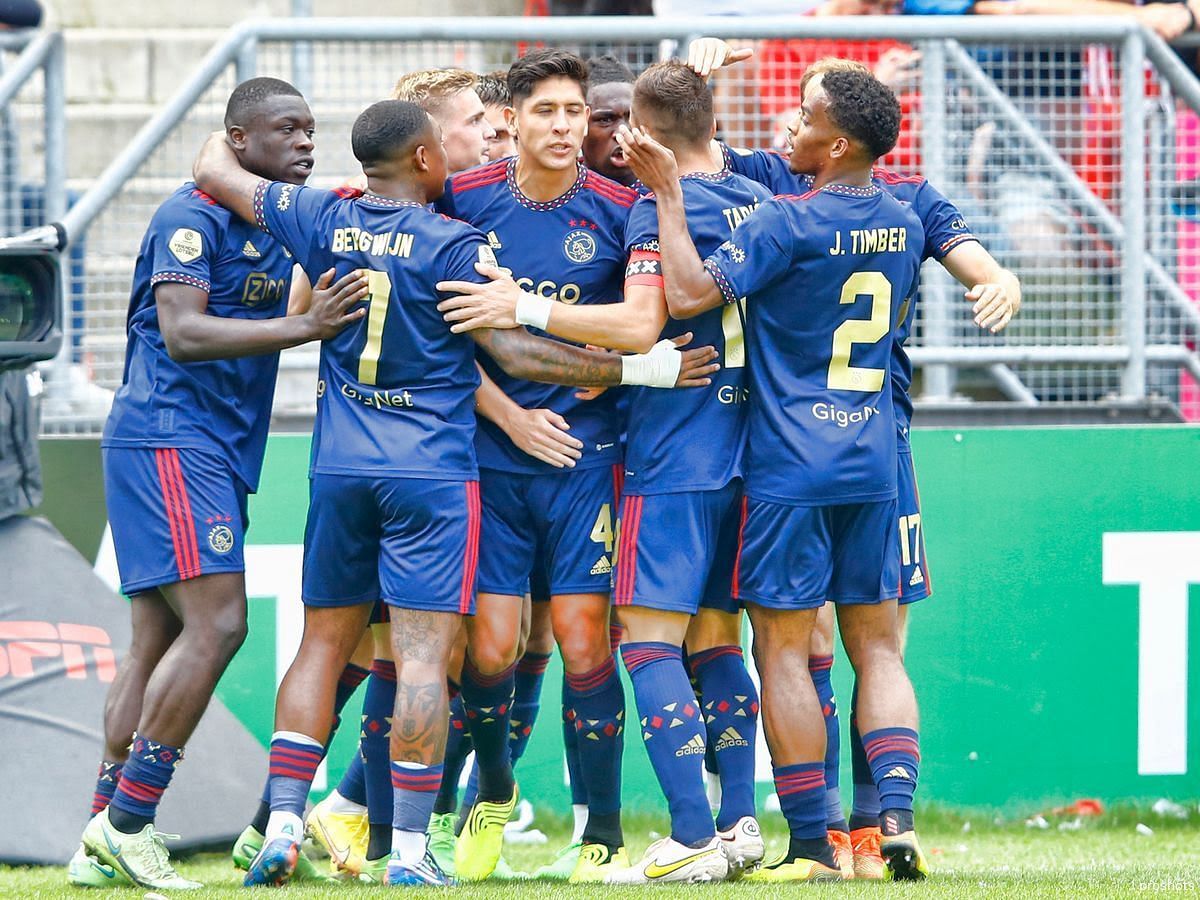 Ajax players celebrate after scoring against FC Utrecht