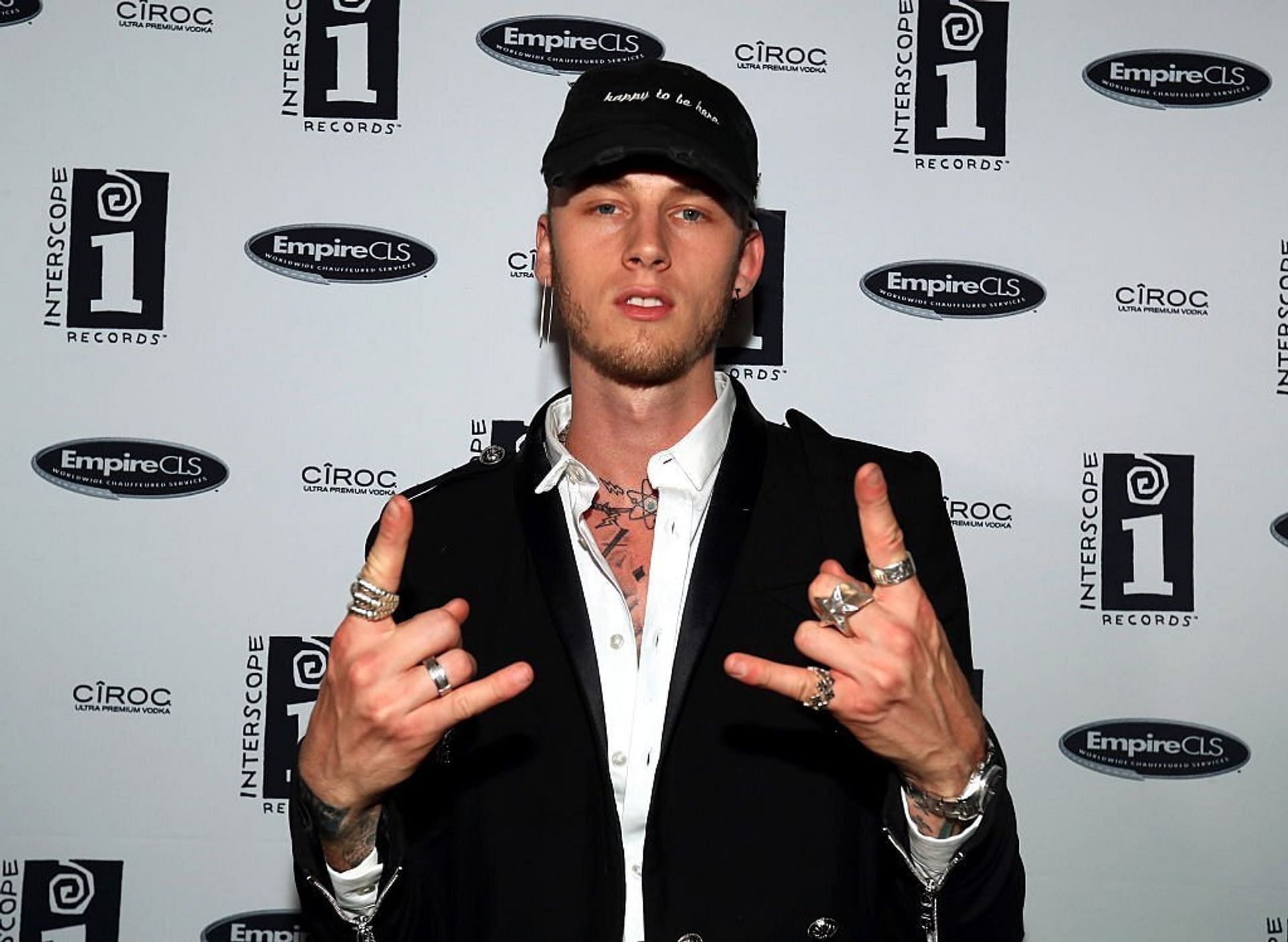 Machine Gun Kelly&#039;s tour bus was painted outside the place where he was scheduled to perform (Image via Christopher Polk/Getty Images)