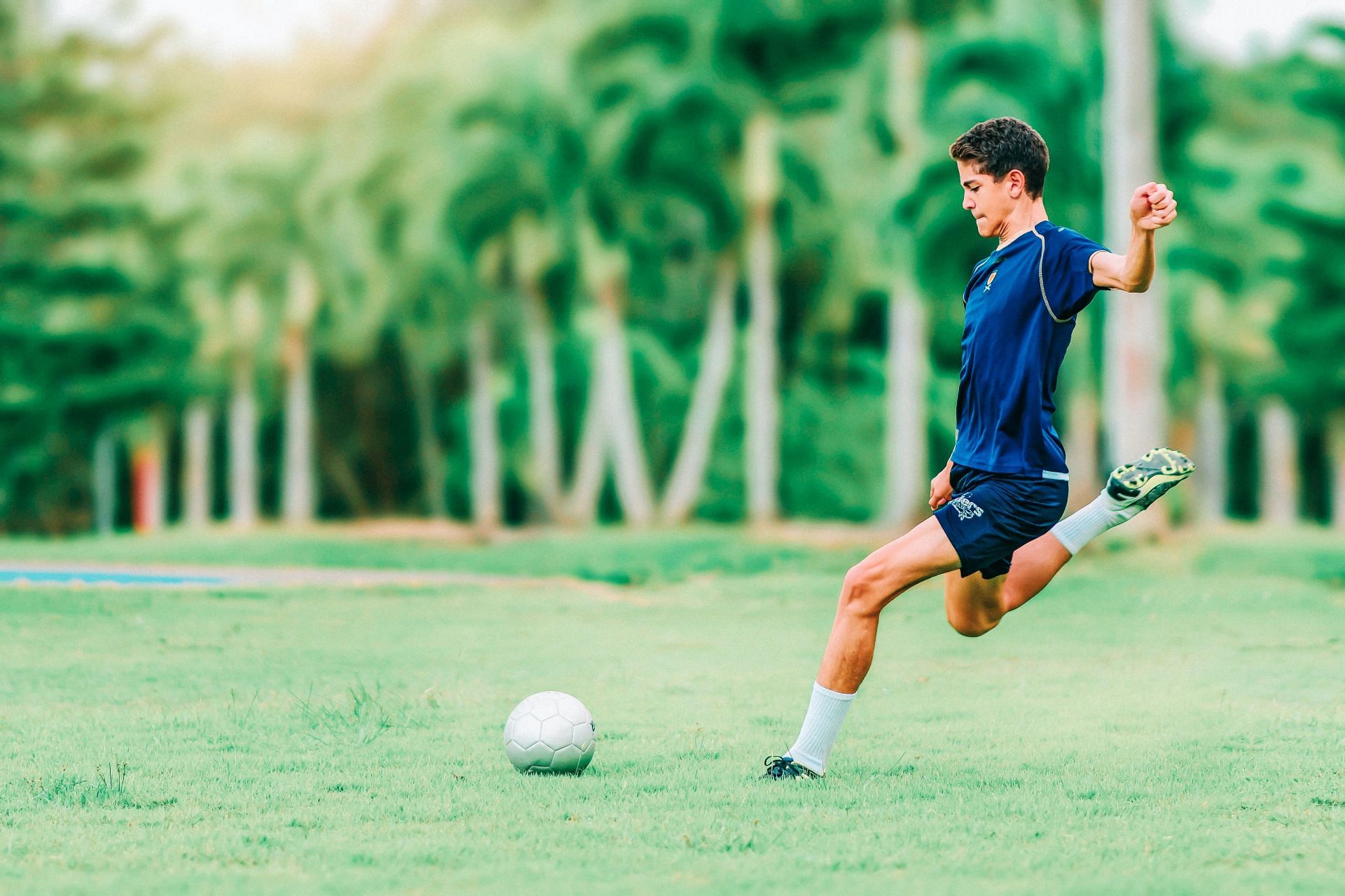 Football is a sport that demands exceptional physical fitness on all levels. (Image via Unsplash/Kobby Mendez)