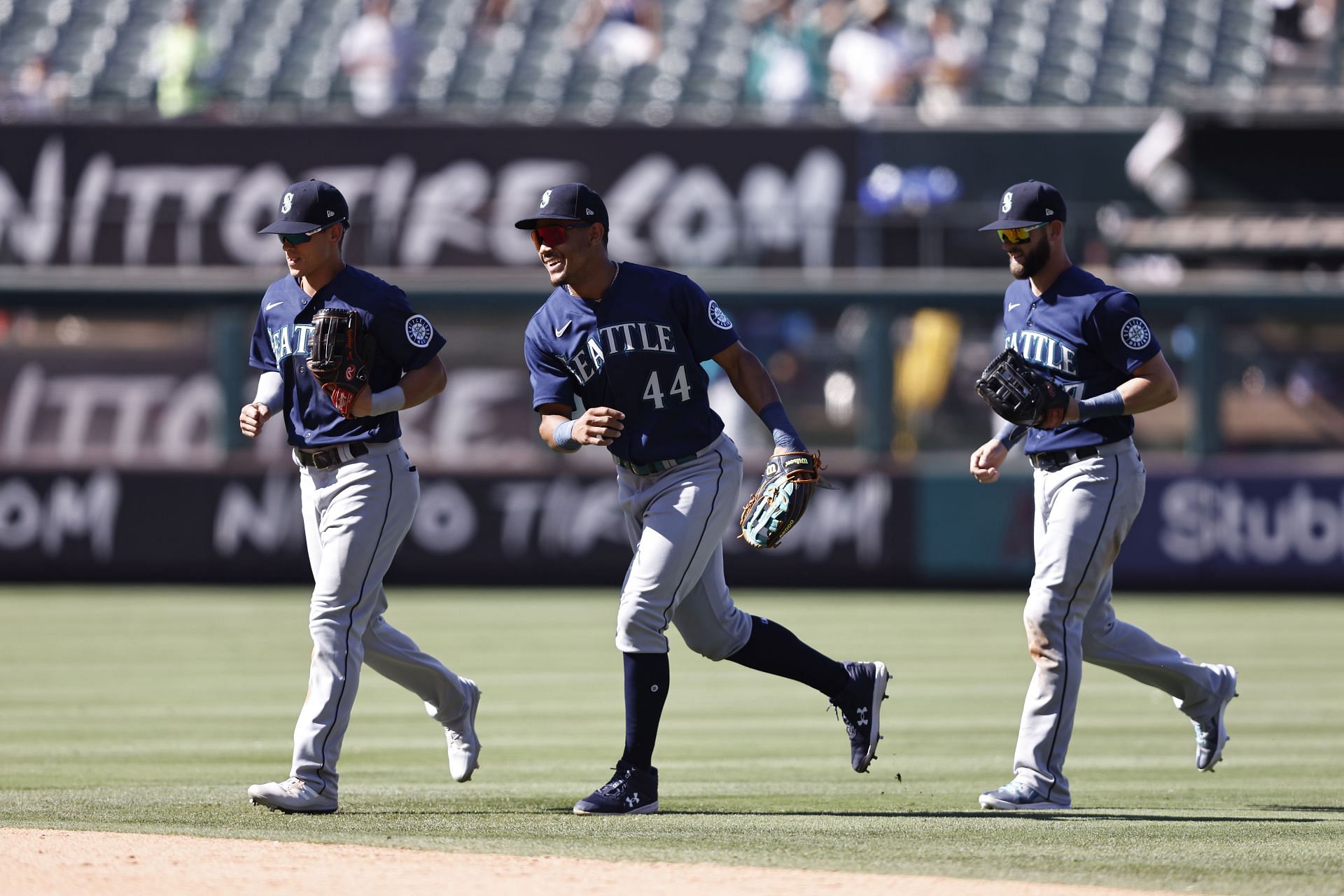 Seattle Mariners celebrate after defeating the Los Angeles Angels 11-7.