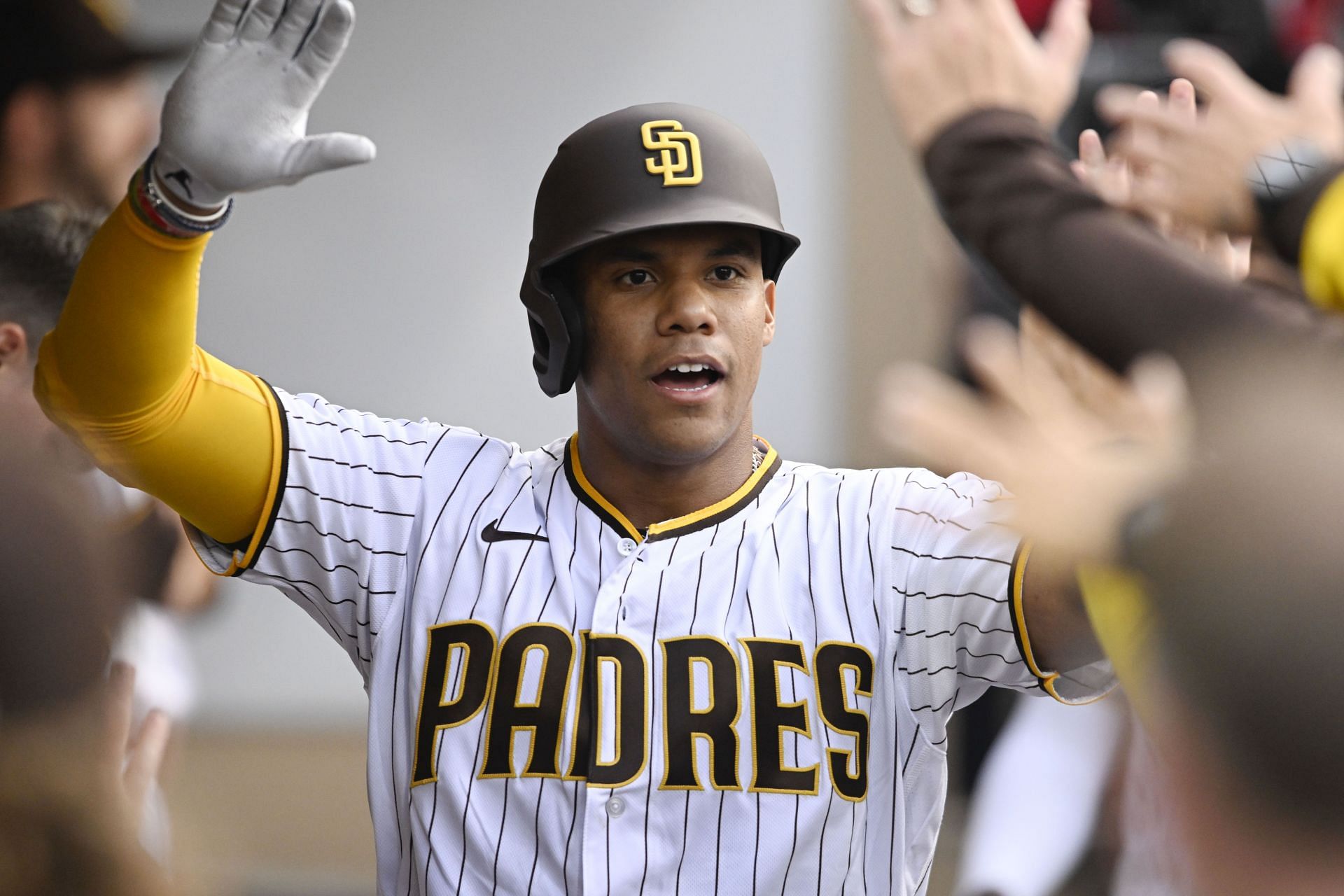 Juan Soto celebrating in his first game with the Padres