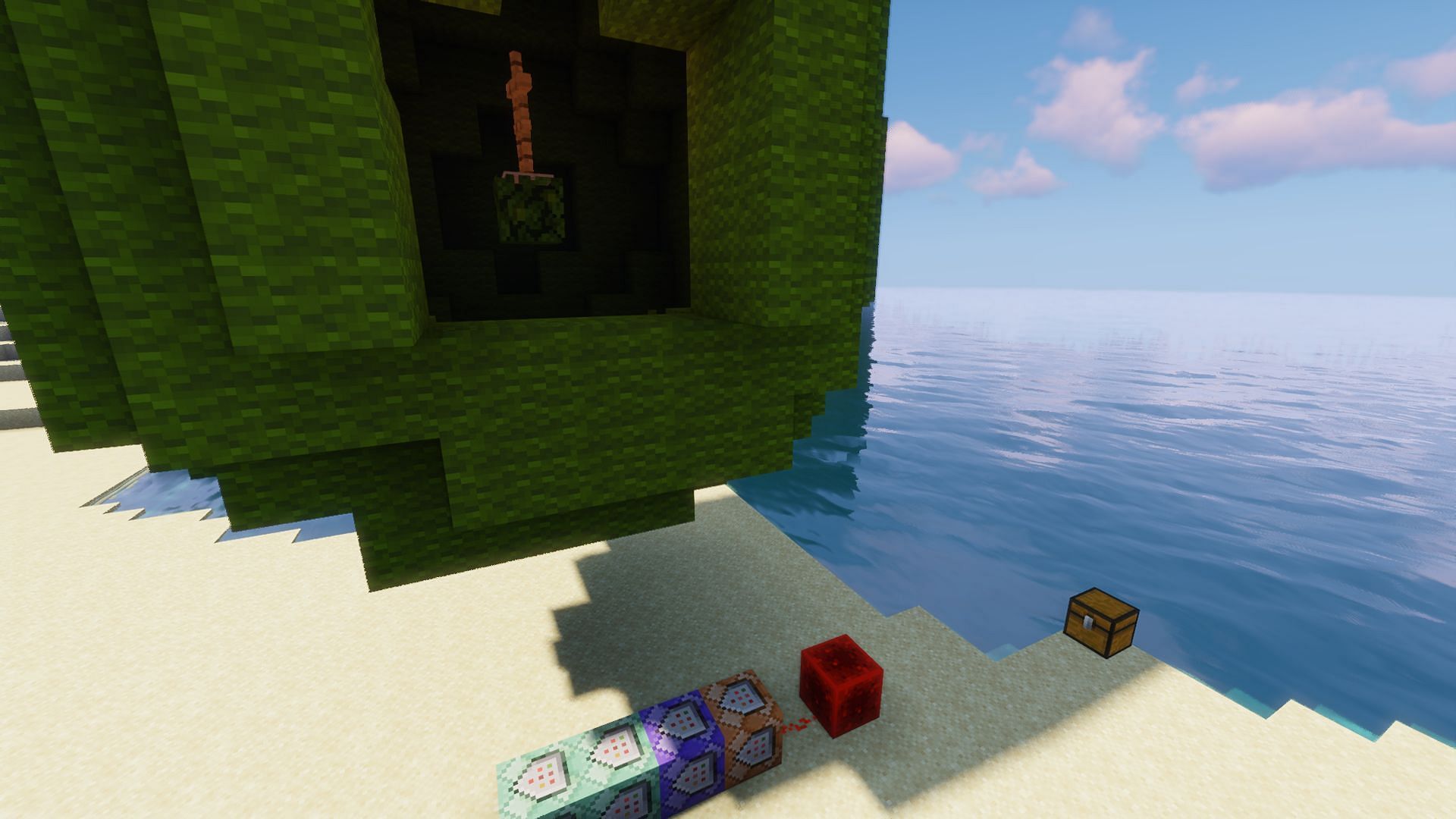 The command blocks being powered, rebuilding the sphere where it was broken (Image via Minecraft)